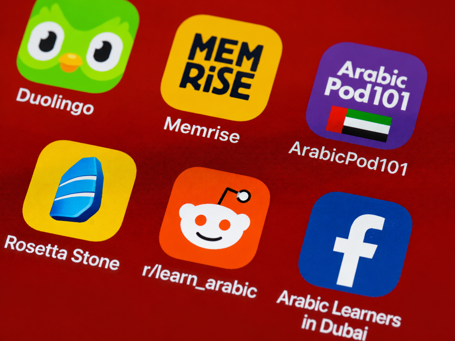 Arabic learning apps including Duolingo, Memrise, ArabicPod101, Rosetta Stone and reddit community on a smartphone screen