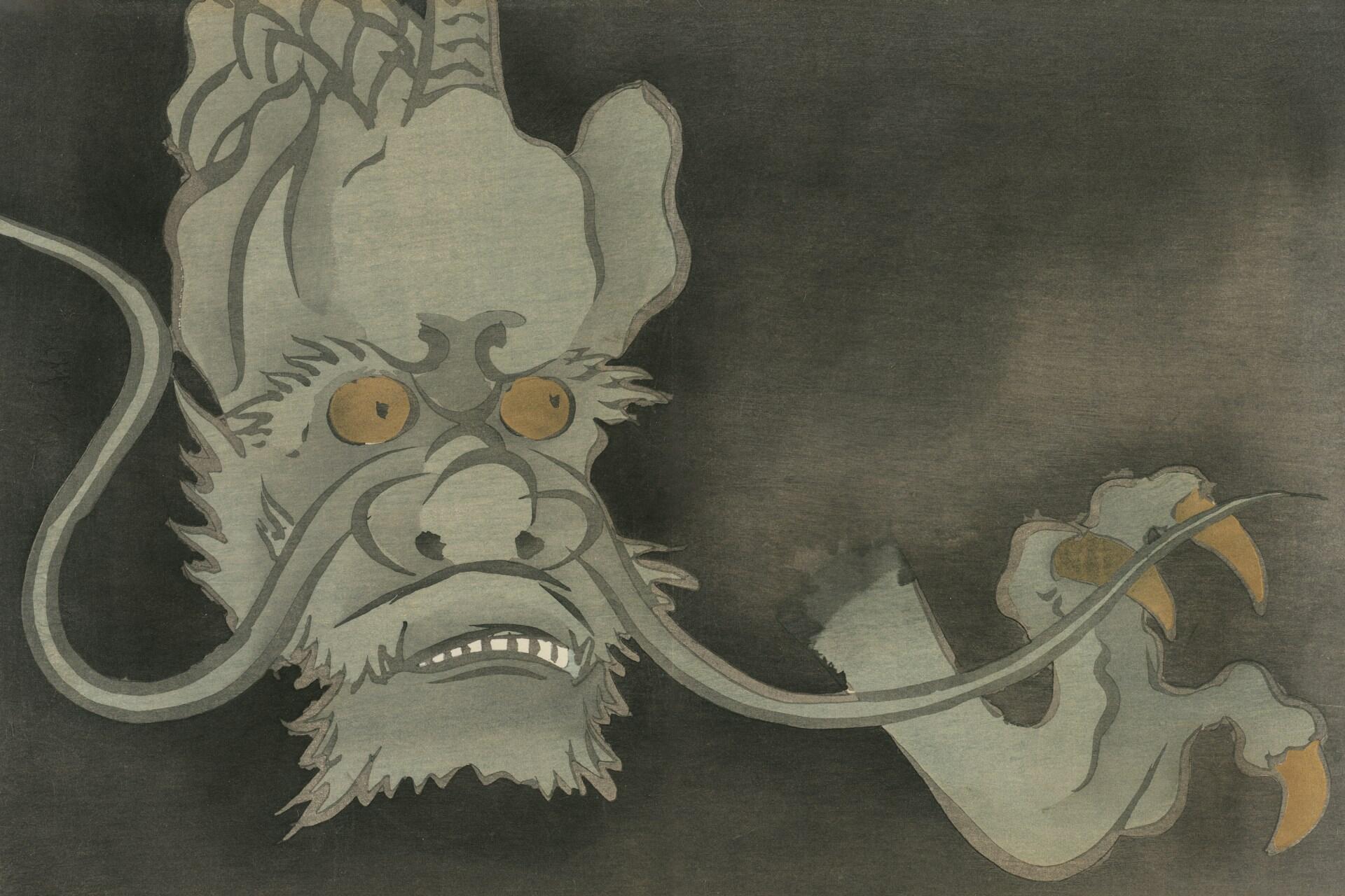 Cabeza y garra de un dragón gris.