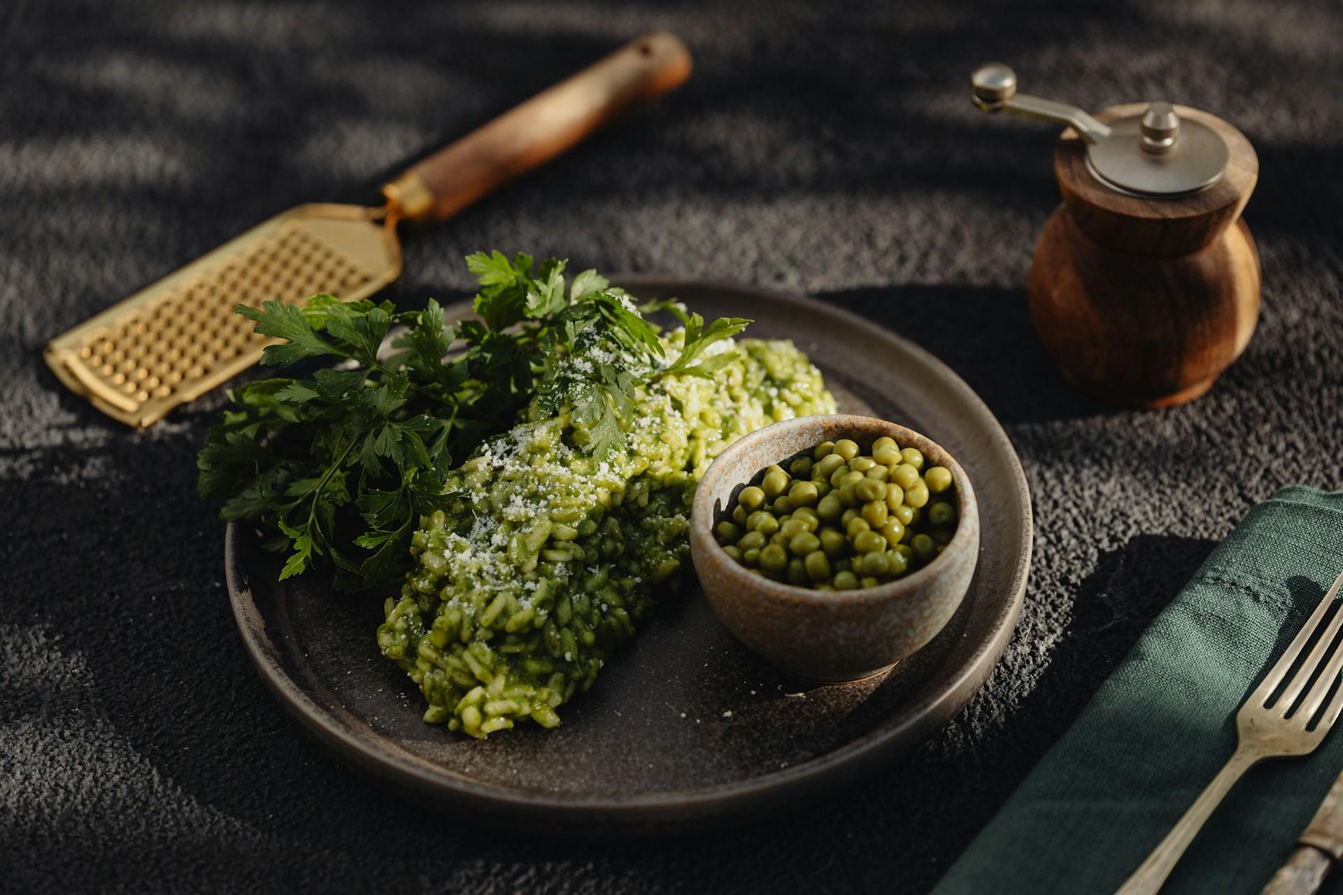 A plate filled with green vegetables.