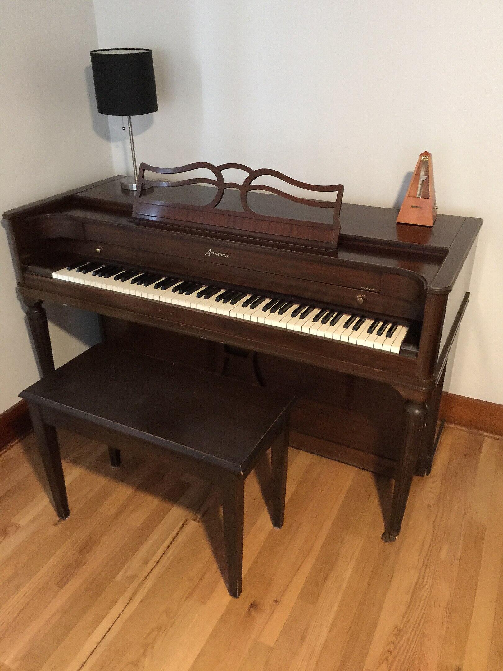 A small spinet and bench.