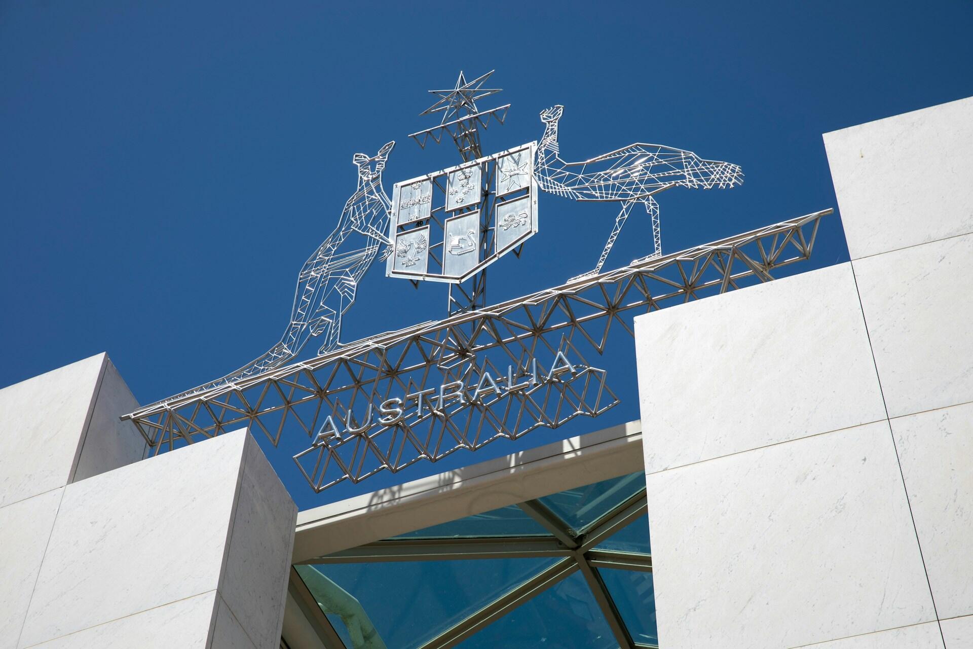 the Coat of Arms in the front of the Australian Parliament House