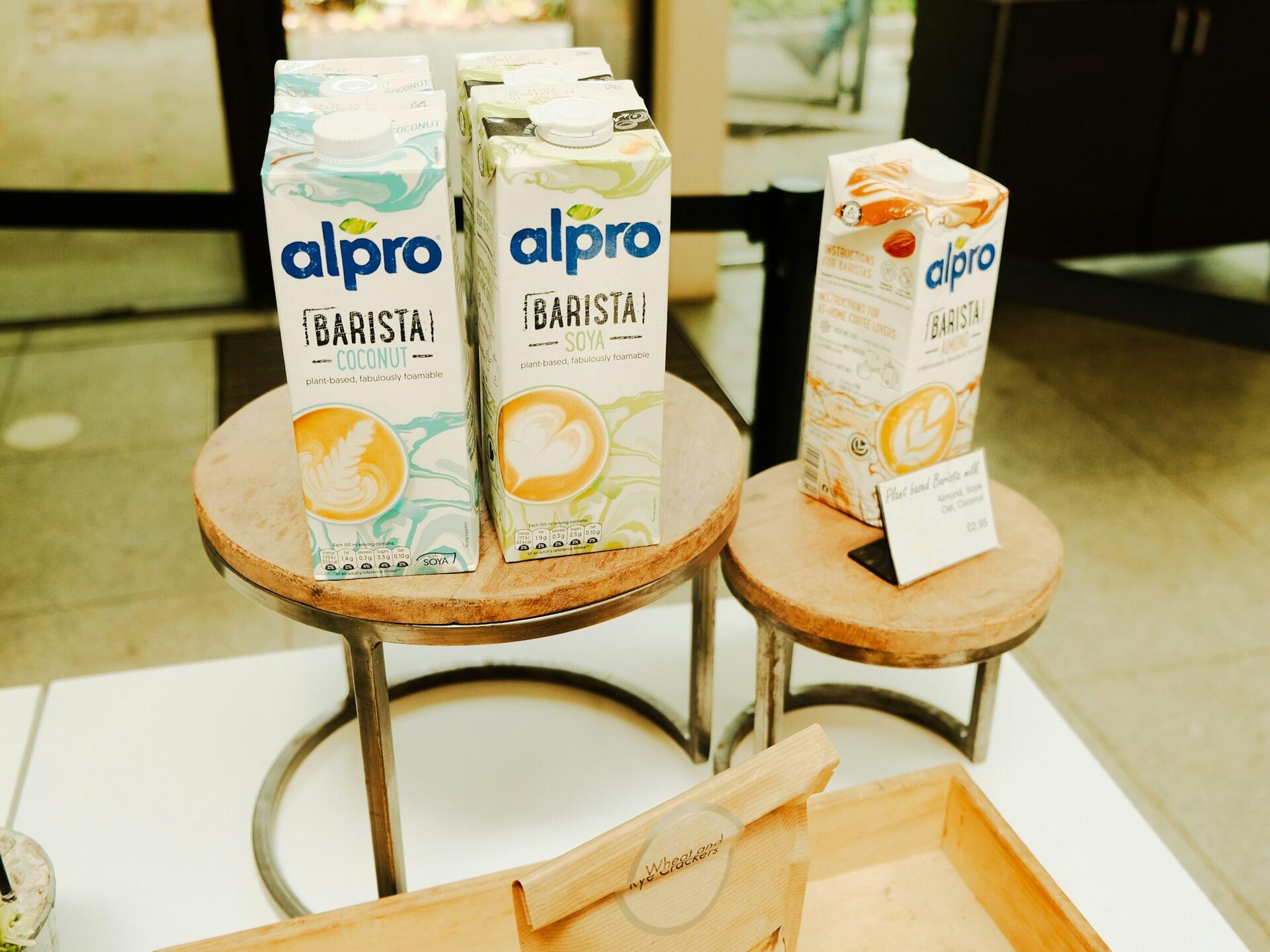 cartons of coconut, soy, and oat milk