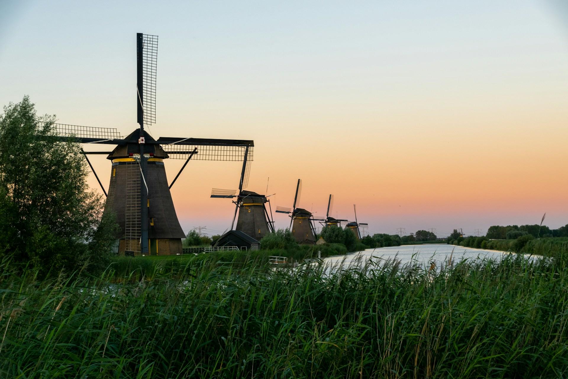 Windmills in the Netherlands: Iconic structures dotting the Dutch landscape, harnessing wind power for centuries.