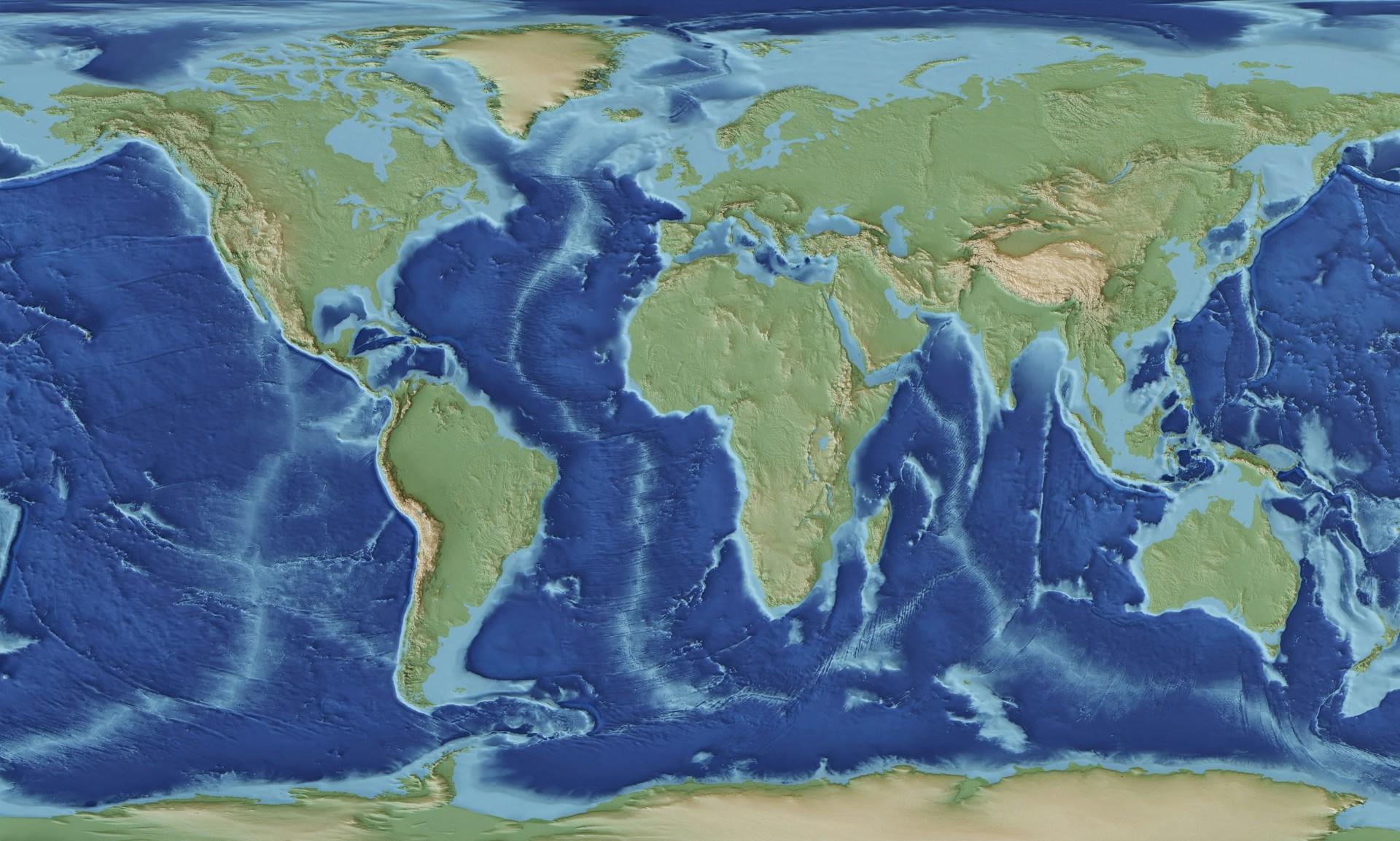 A blue and green map of the world's continents on a flat plane.