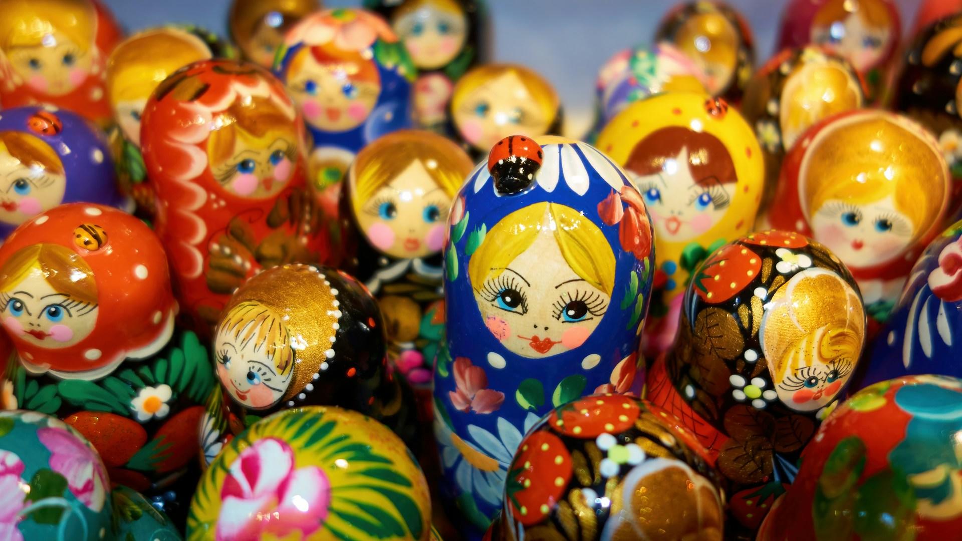 An assortment of Russian dolls in no particular order.