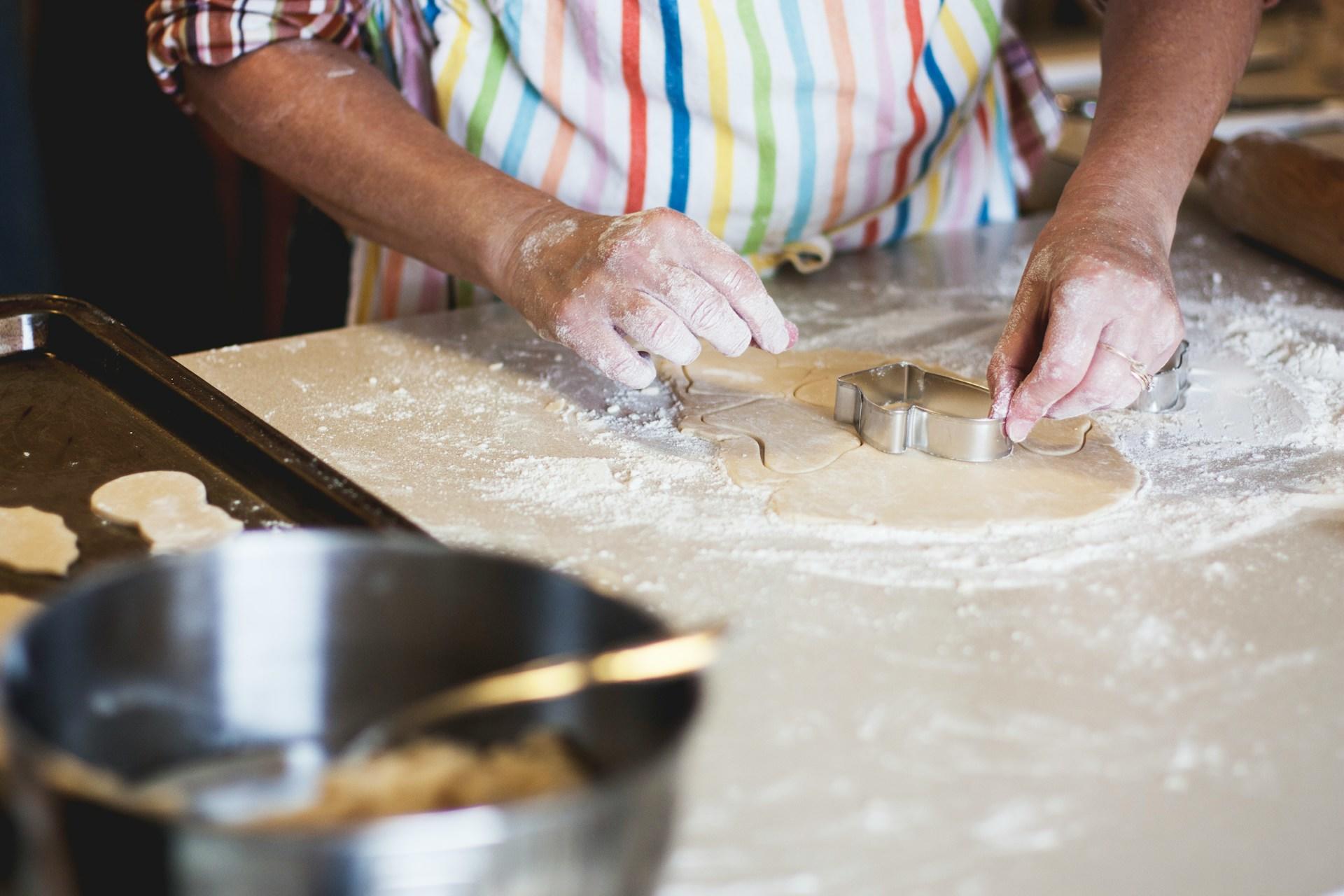 a person making cookies