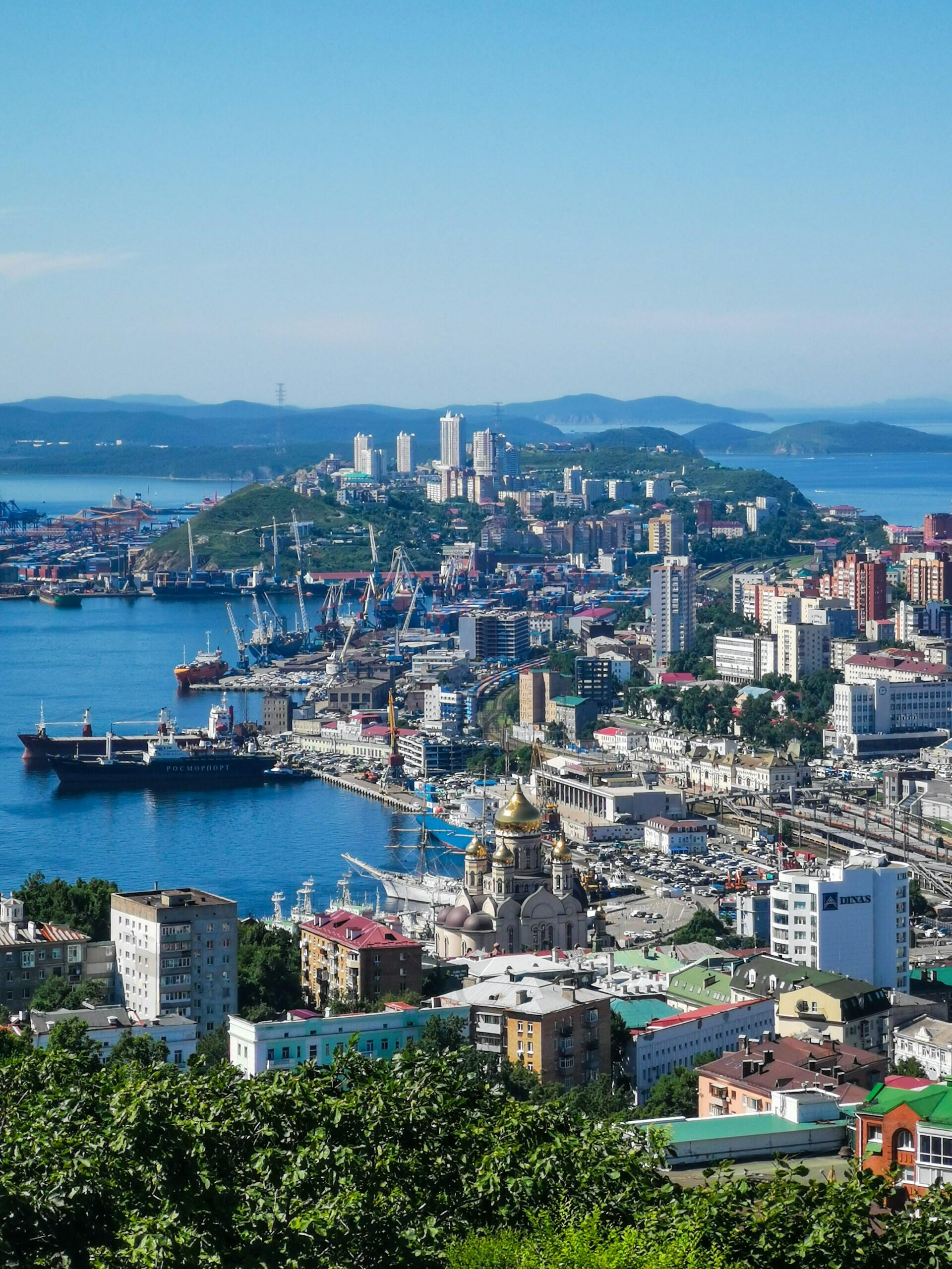 Vladivostok and surrounding water on a sunny day.