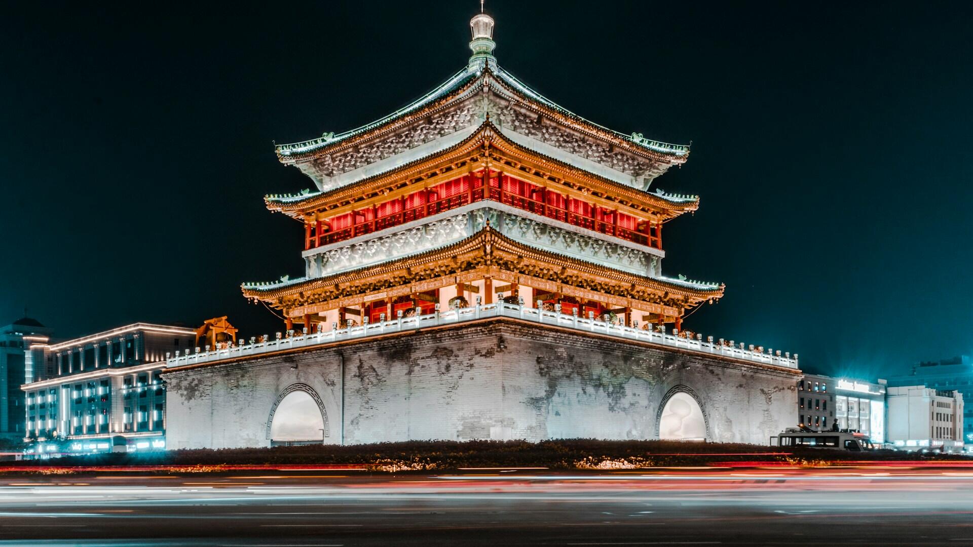 Illuminated ancient bell tower at night, in Xi'an, China.