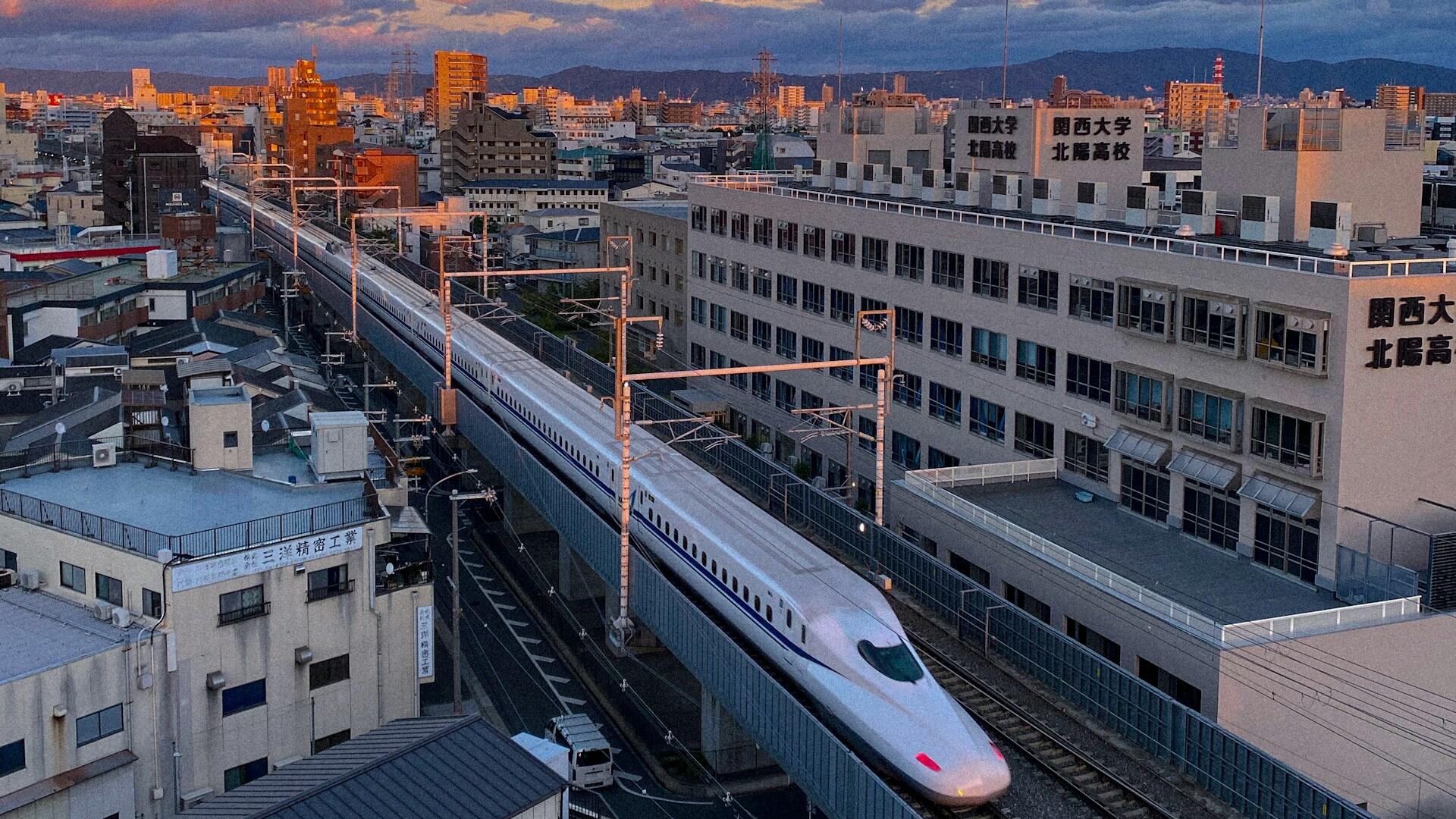 overhead view of a high speed rail train in Osaka, Japan