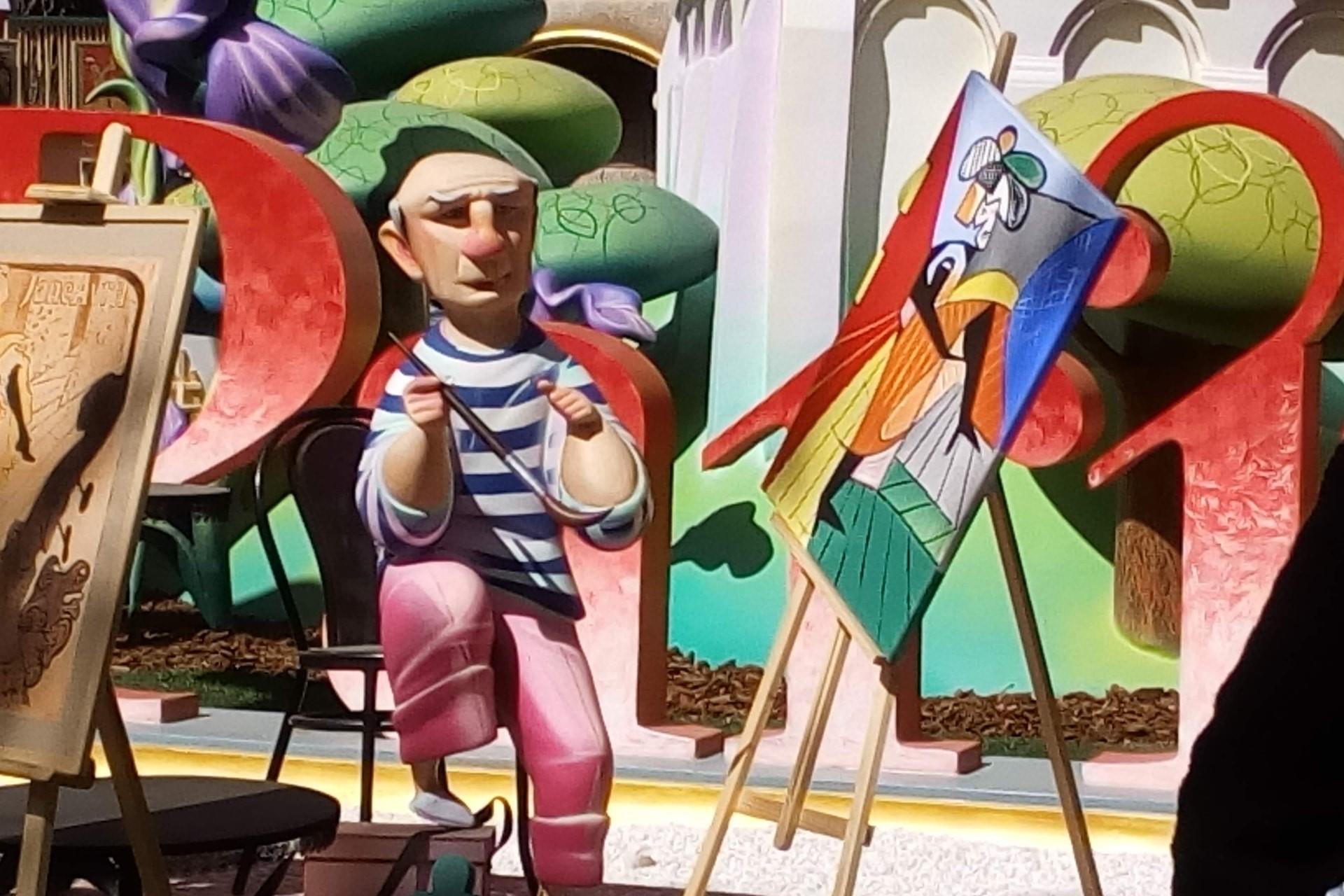 A caricature sculpture of Pablo Picasso.