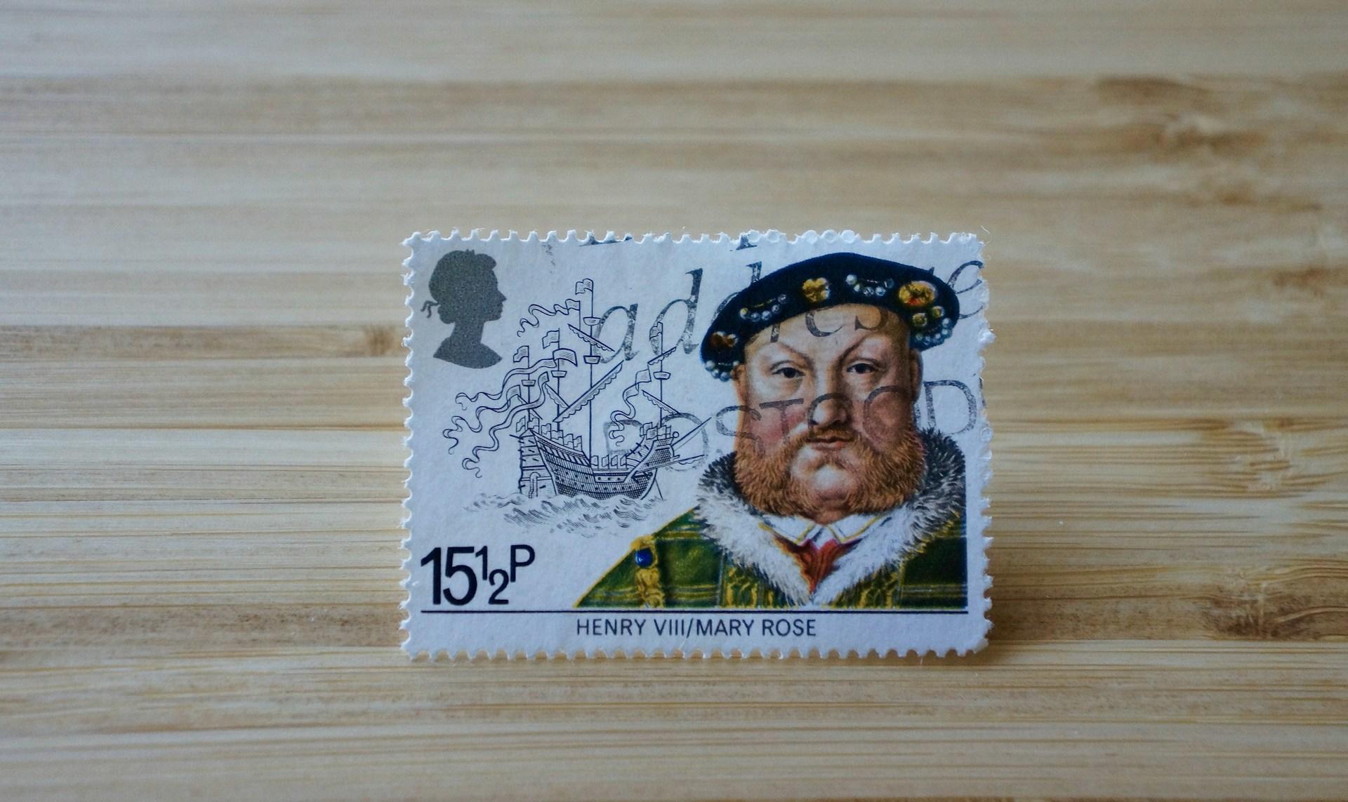 a postage stamp with a portrait of henry viii on it