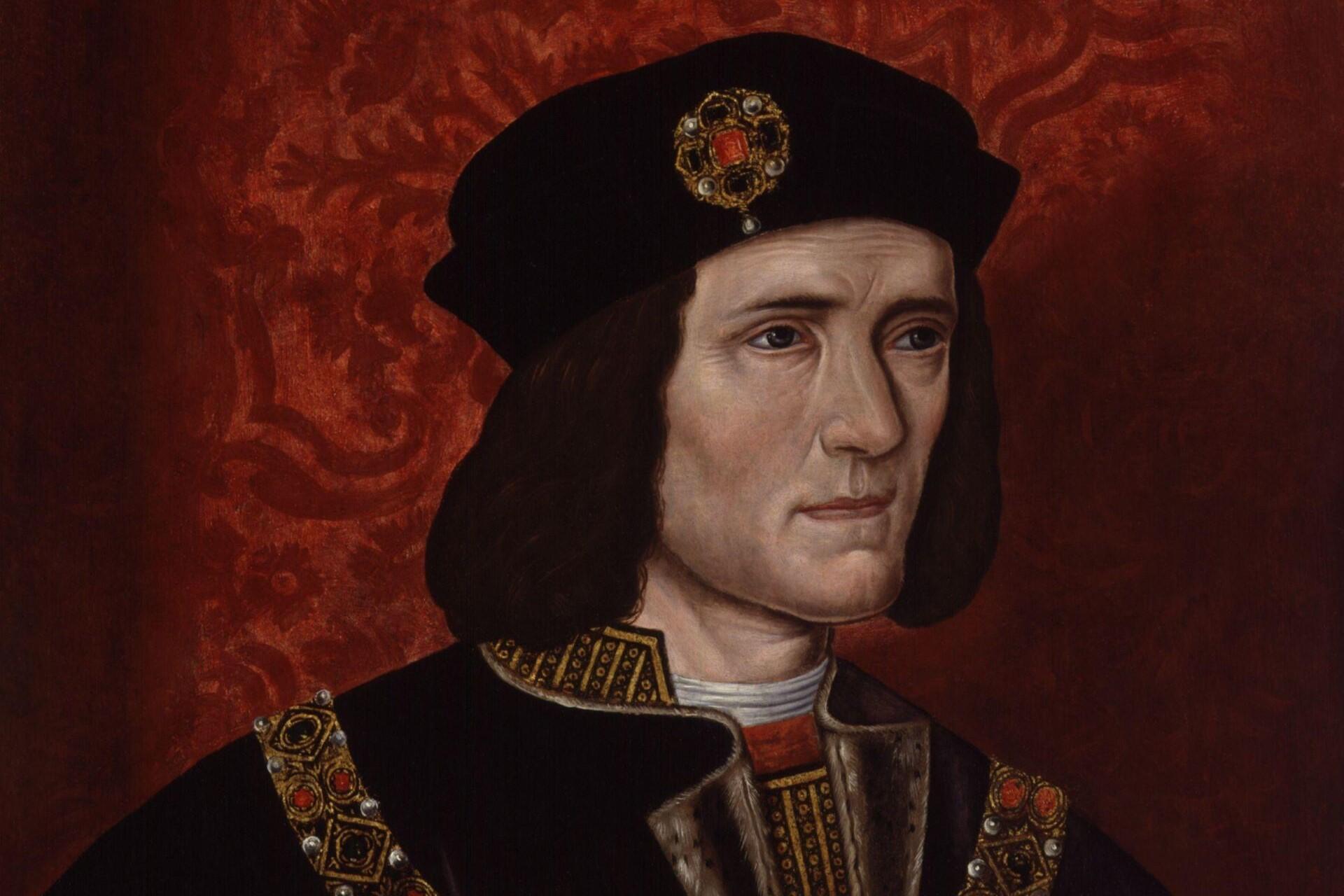 Portrait of Richard III wearing Yorkist royal clothing and black cap against a red Tudor-era background.