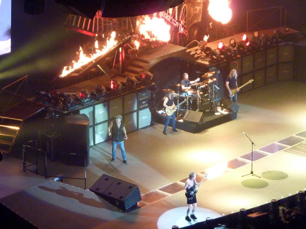 Did Angus Young play guitar?