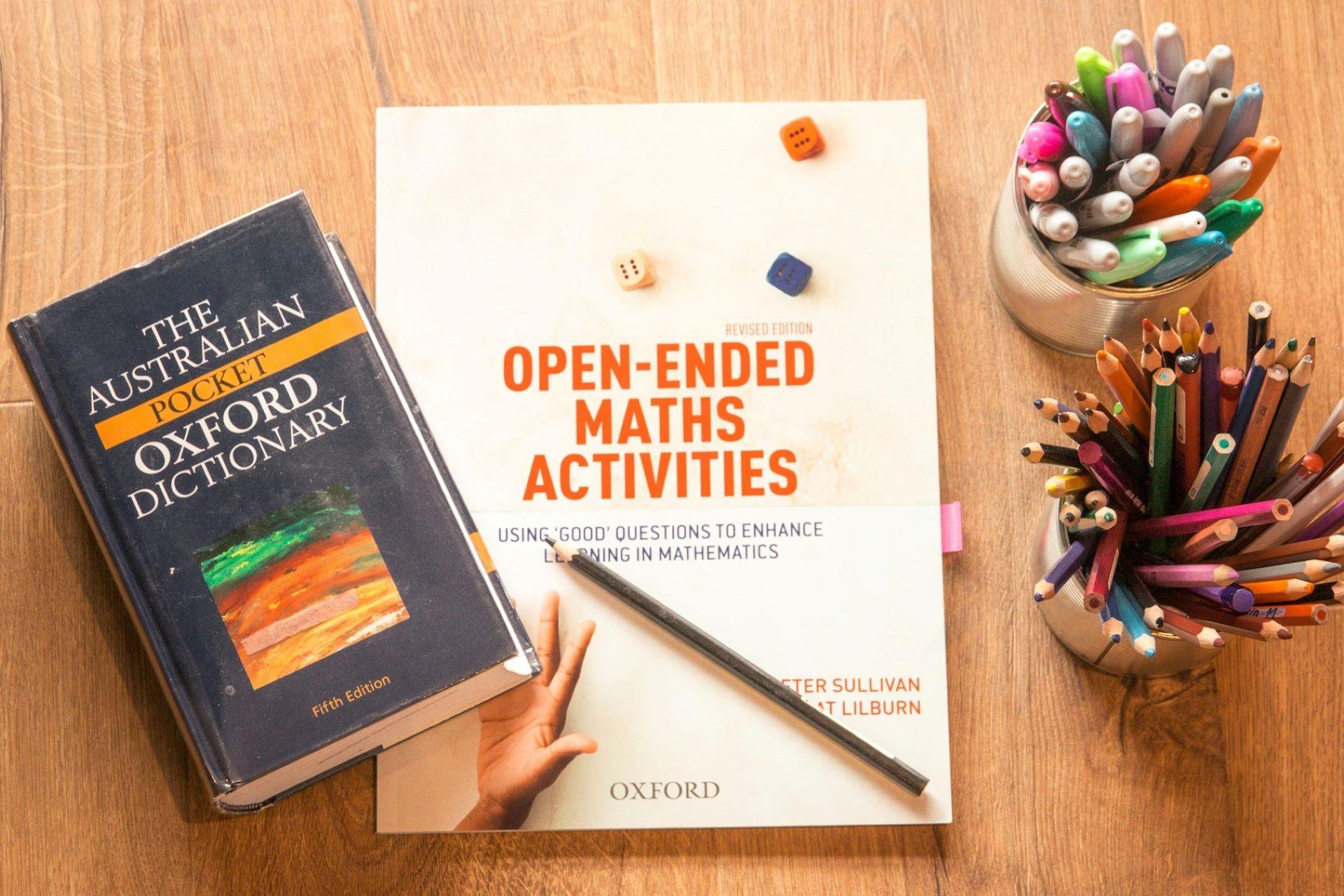 An Australian dictionary next to a maths book.