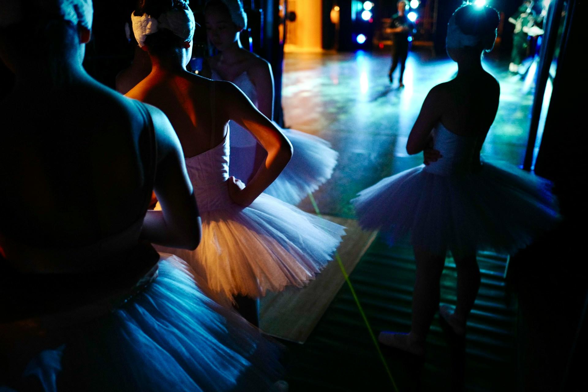 Young ballet dancers waiting.