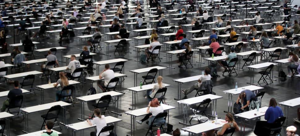Students take exams on mass for physics