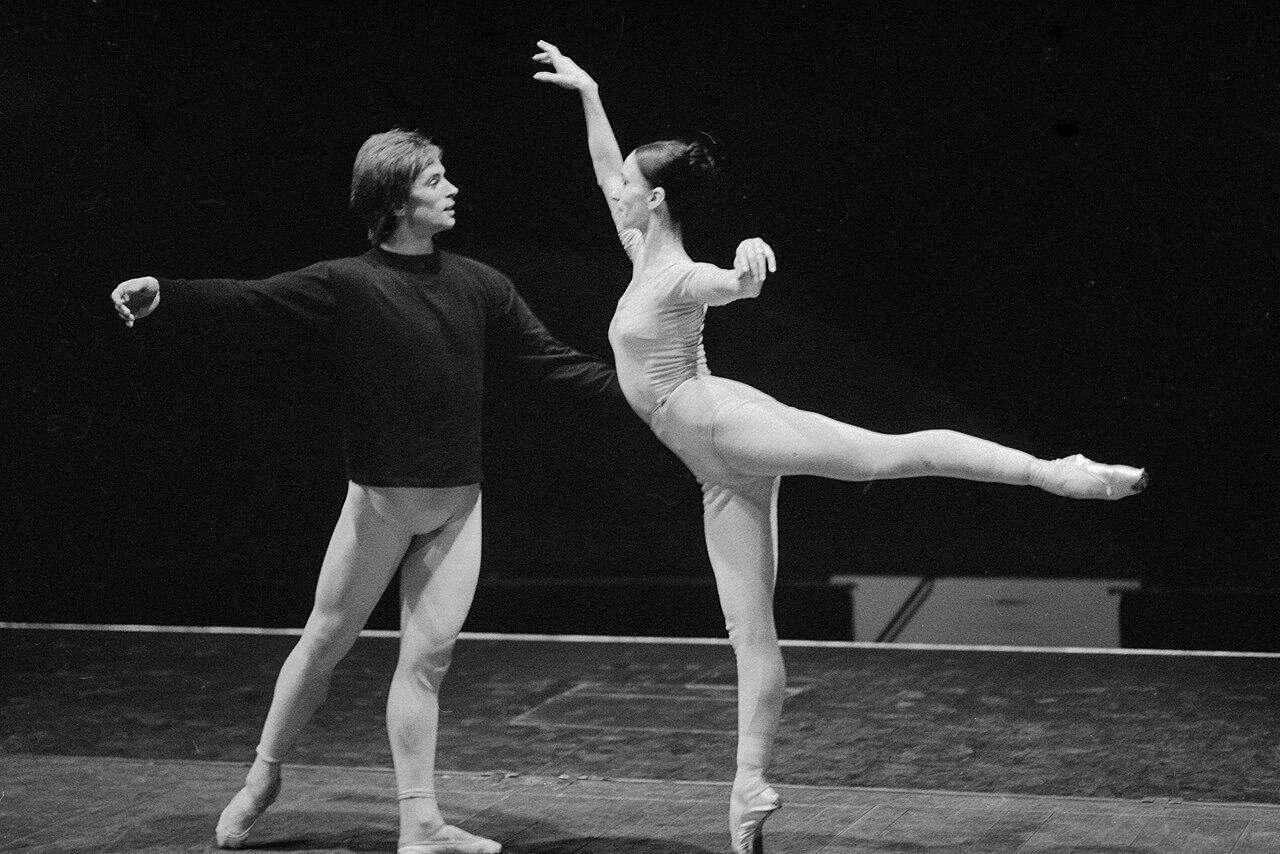 Rudolf Nureyev and a female dancer performing together on stage.