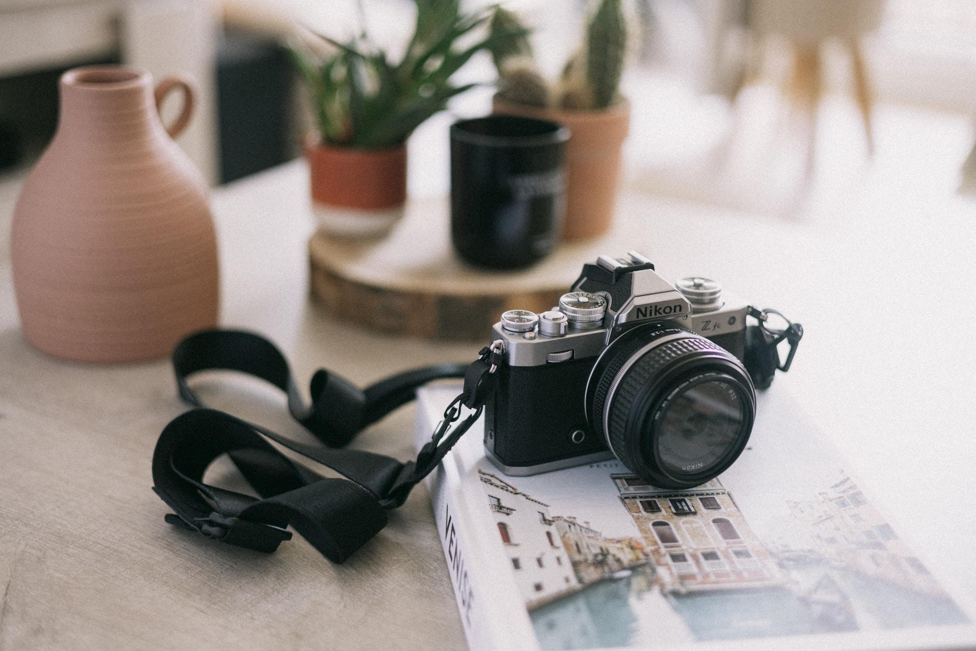 A shallow focus photo of a Nikon Z FC camera.