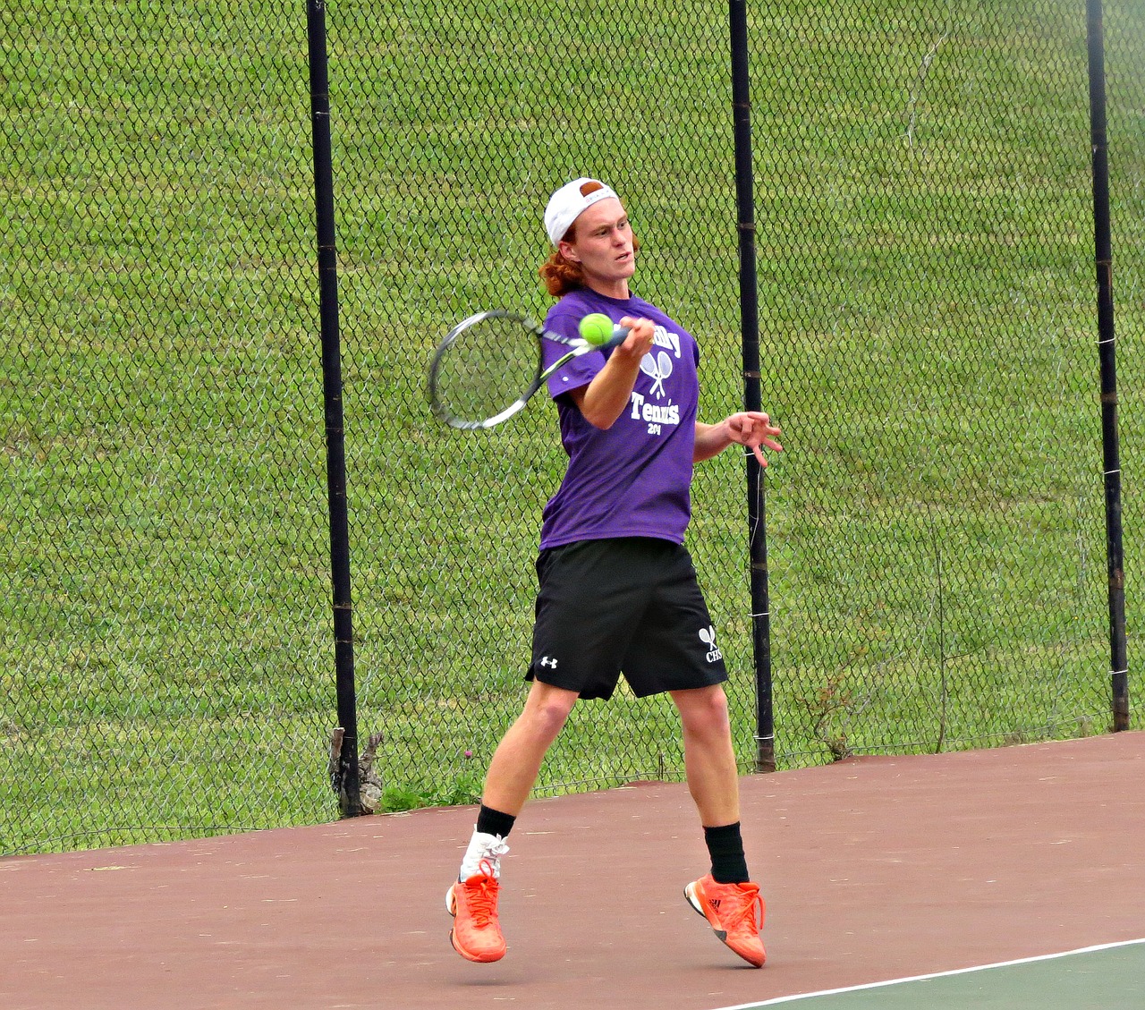 Where can I learn tennis in Brisbane?