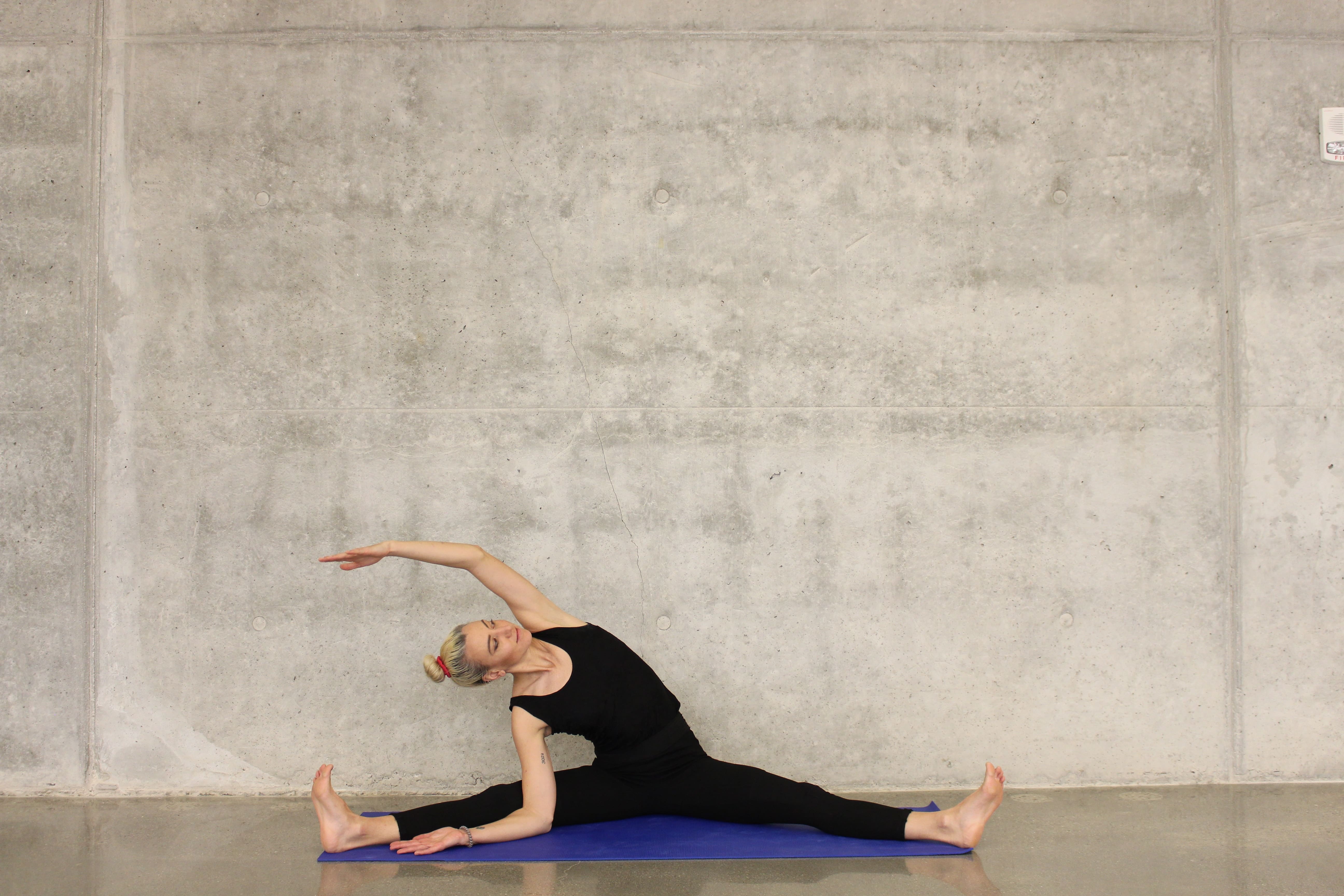 a woman practising yoga.