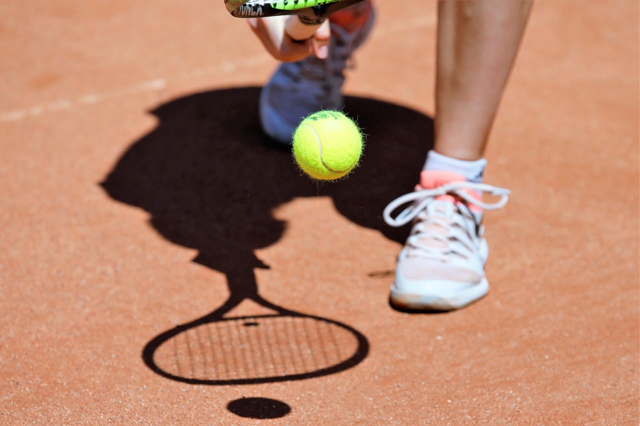 What equipment do you need to buy for tennis lessons?