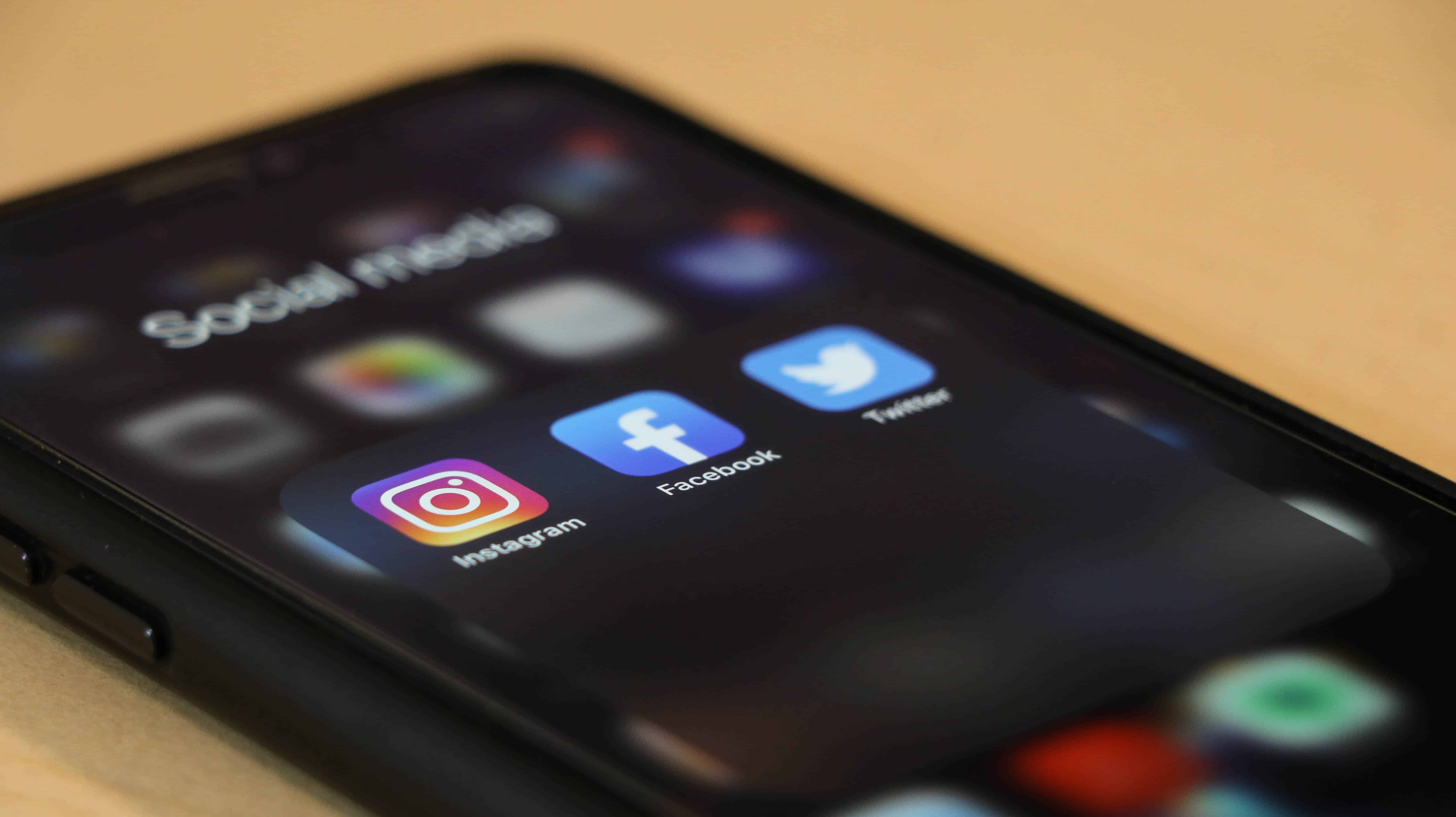 Smartphone displaying social media apps