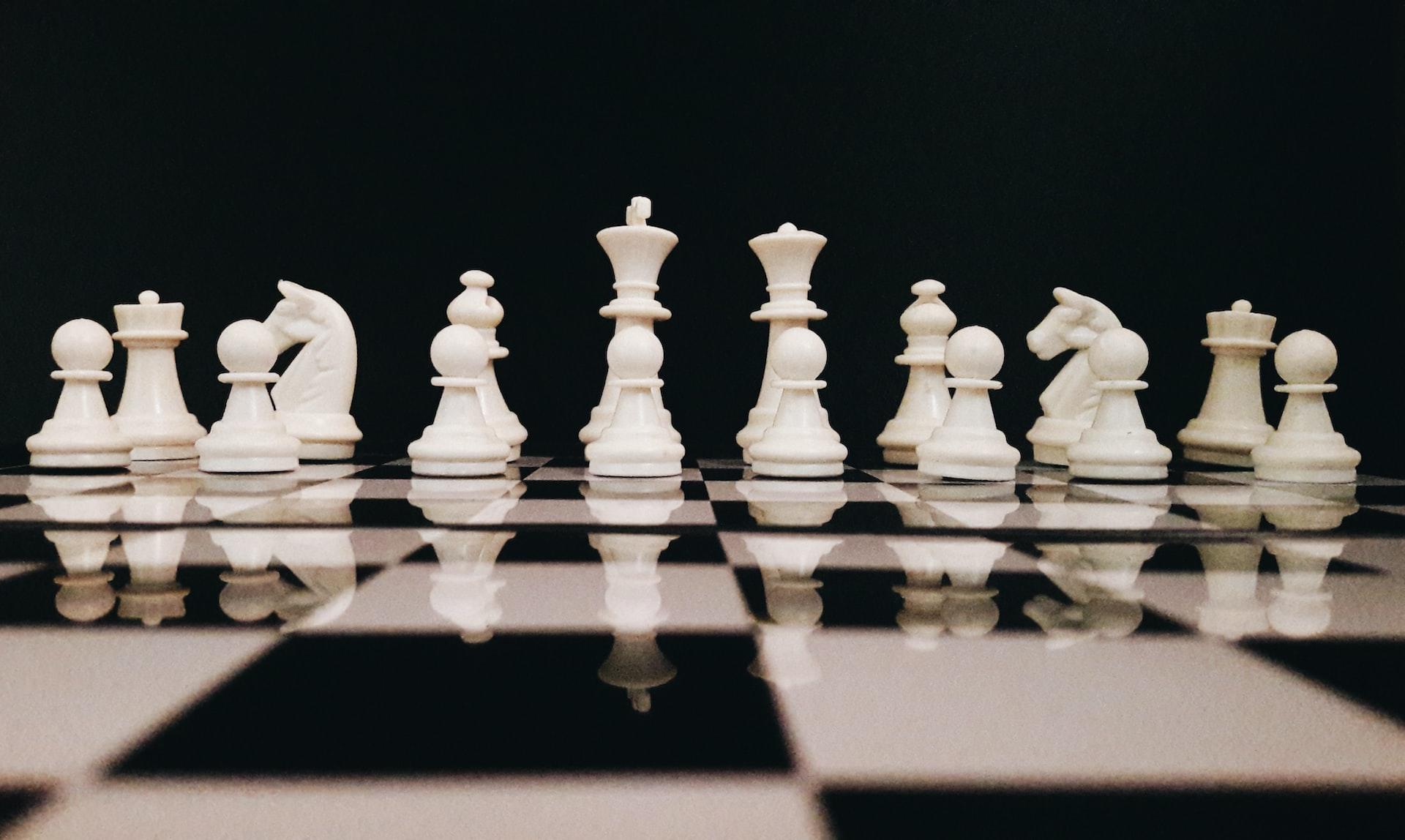 White chess pieces in the starting position