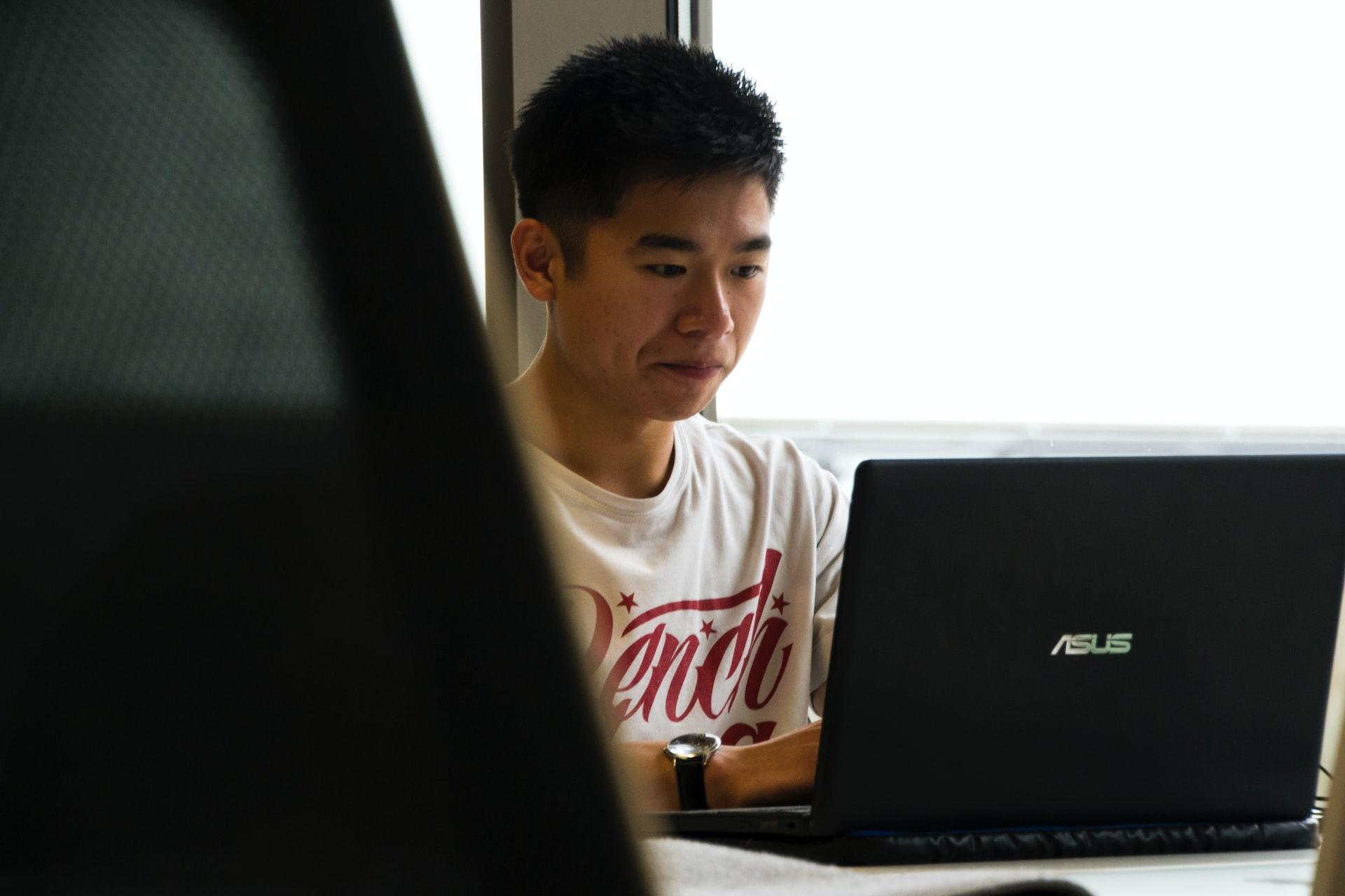 Man studying at a computer