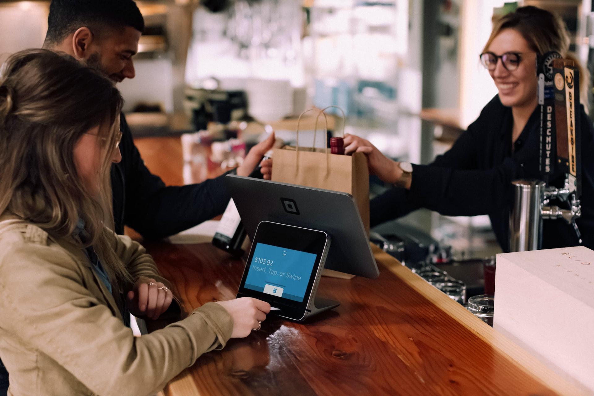People paying with a digital wallet