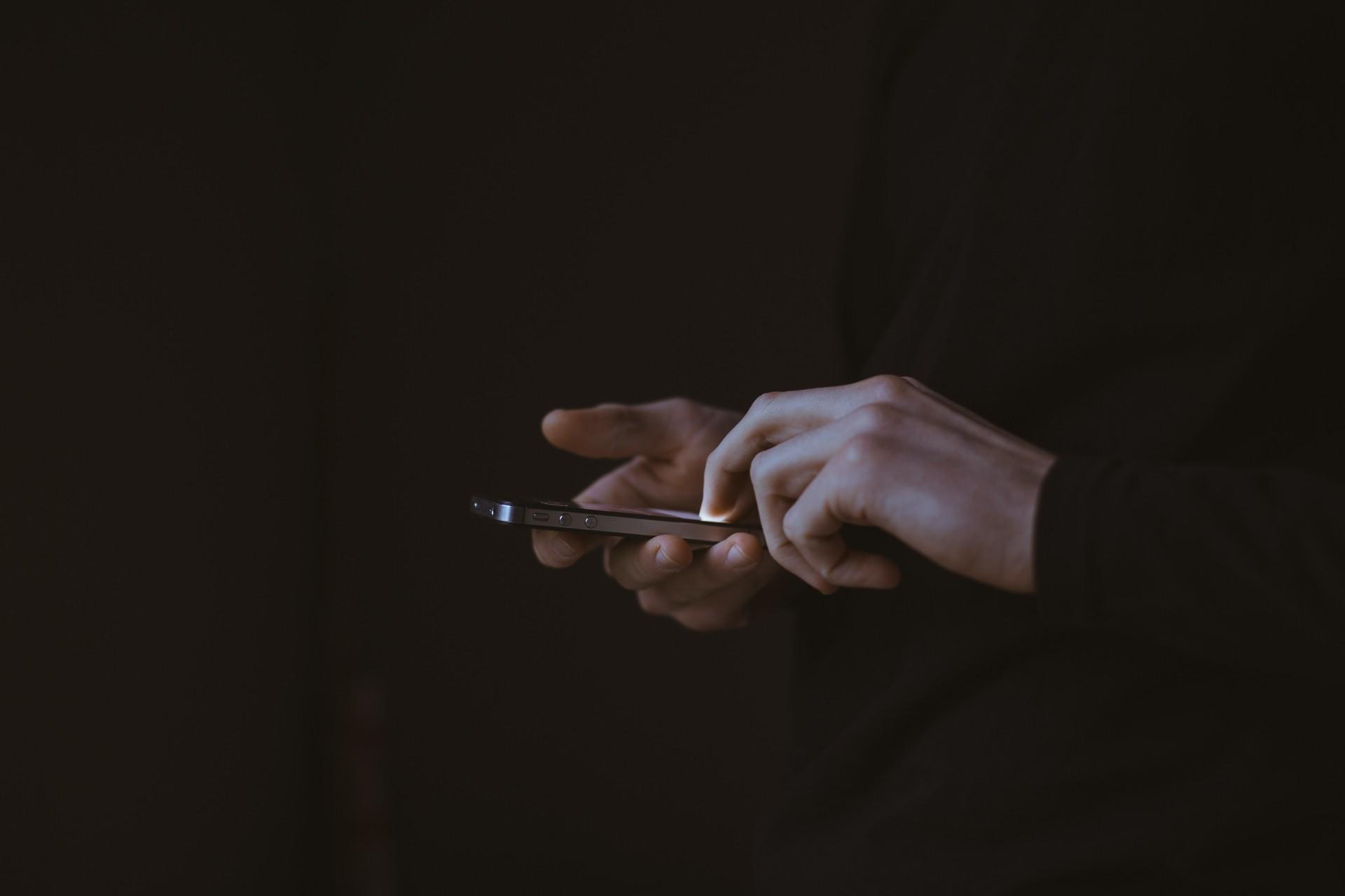 A person looking using their phone