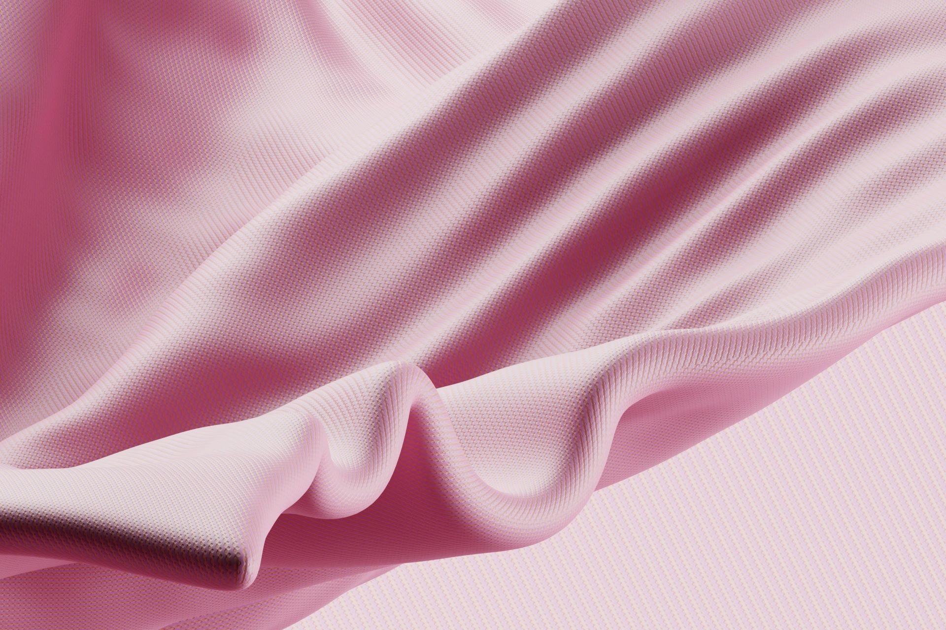 A closeup of a delicate pink fabric.