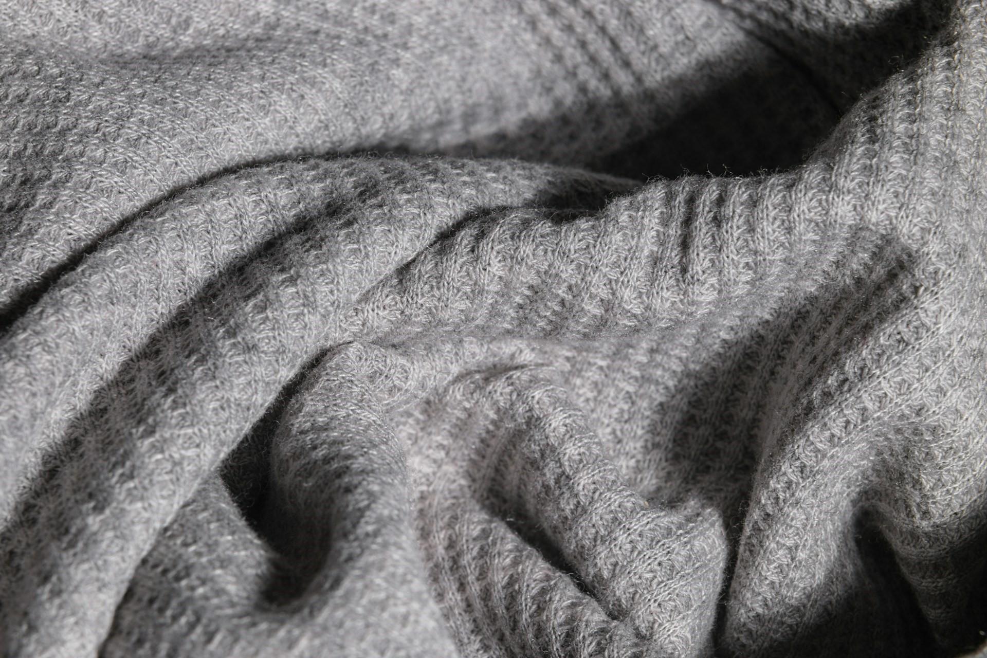 Closeup of a grey fabric.