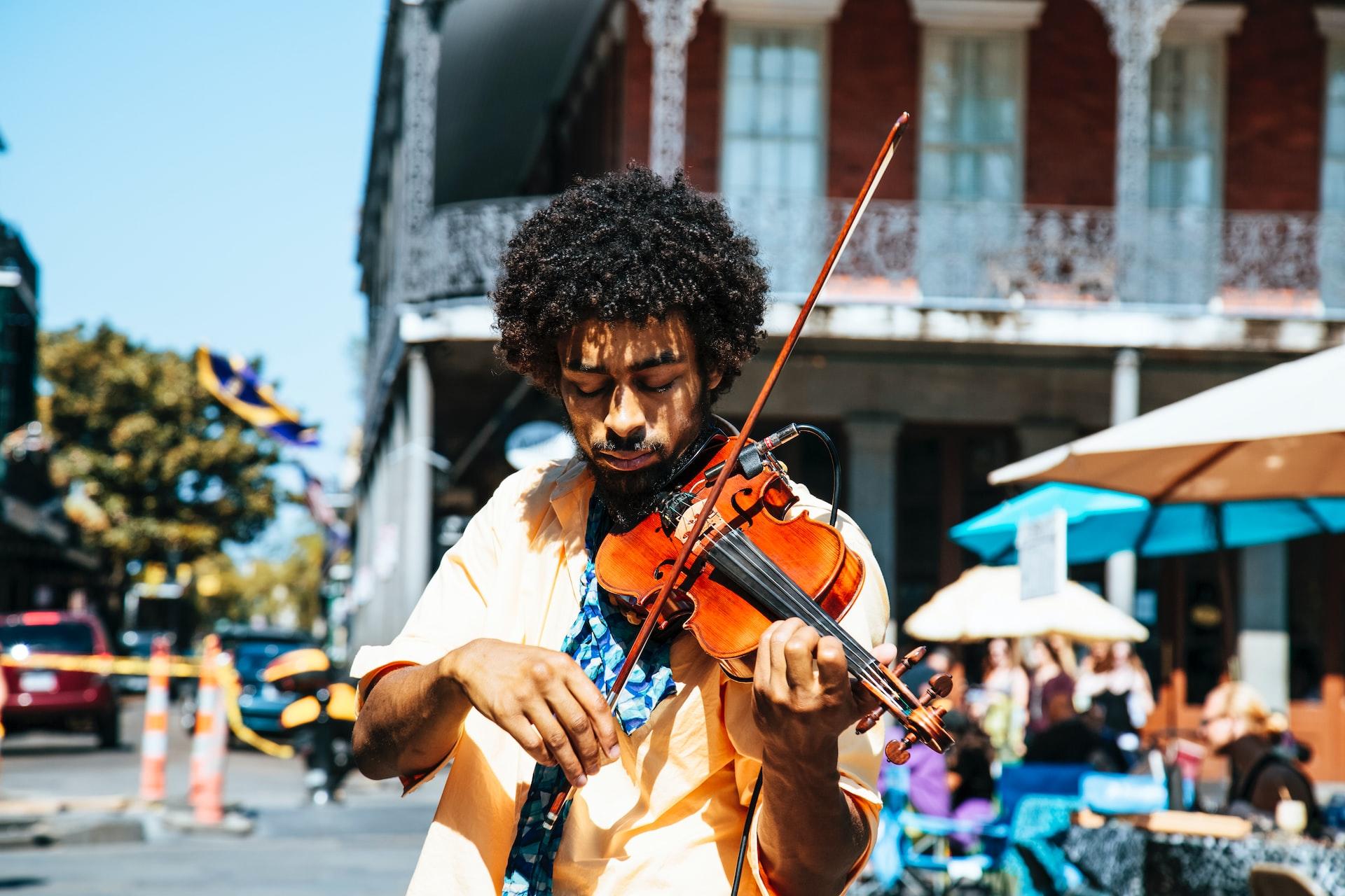 A man playing violin in the street