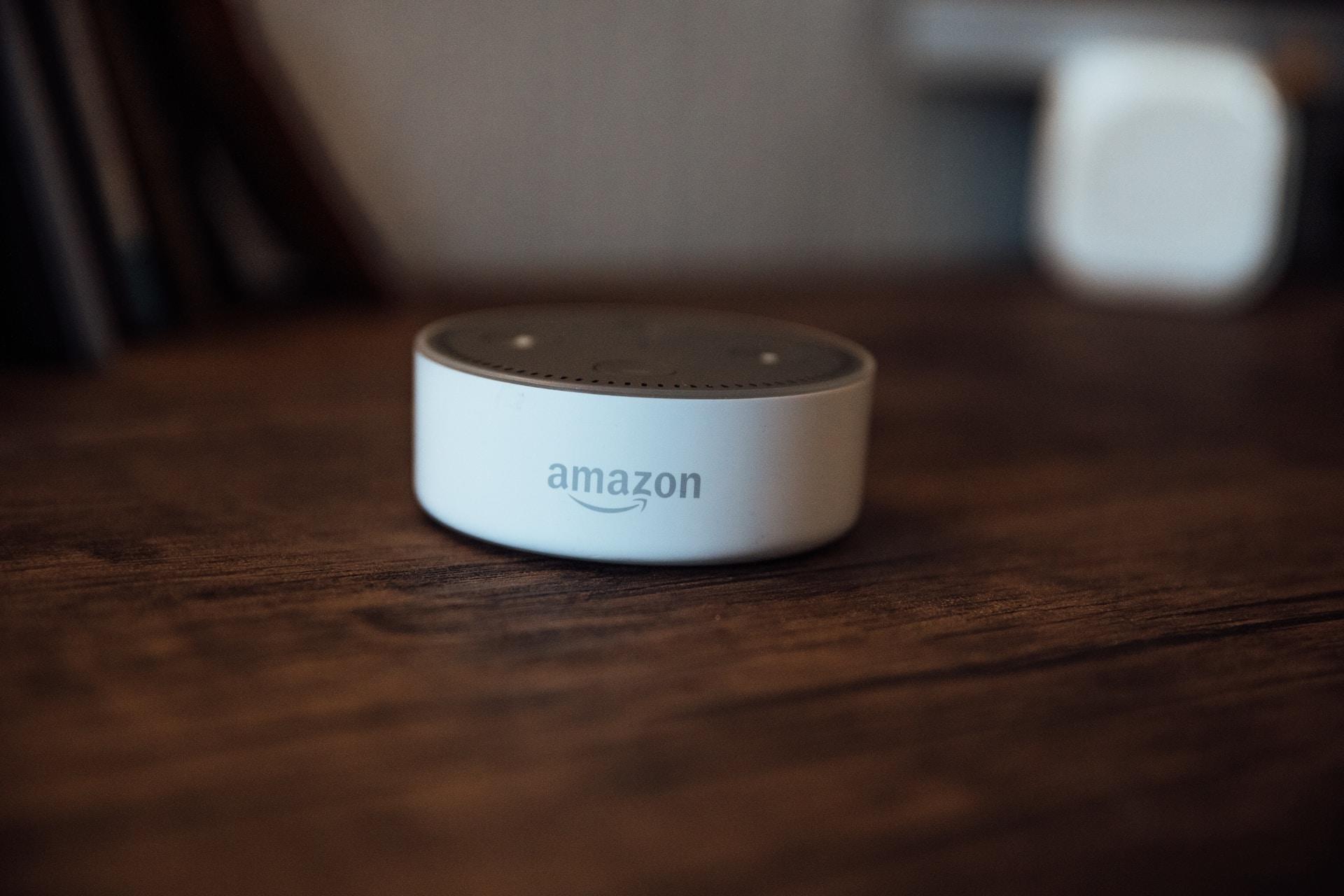 An Amazon speaker on a table.