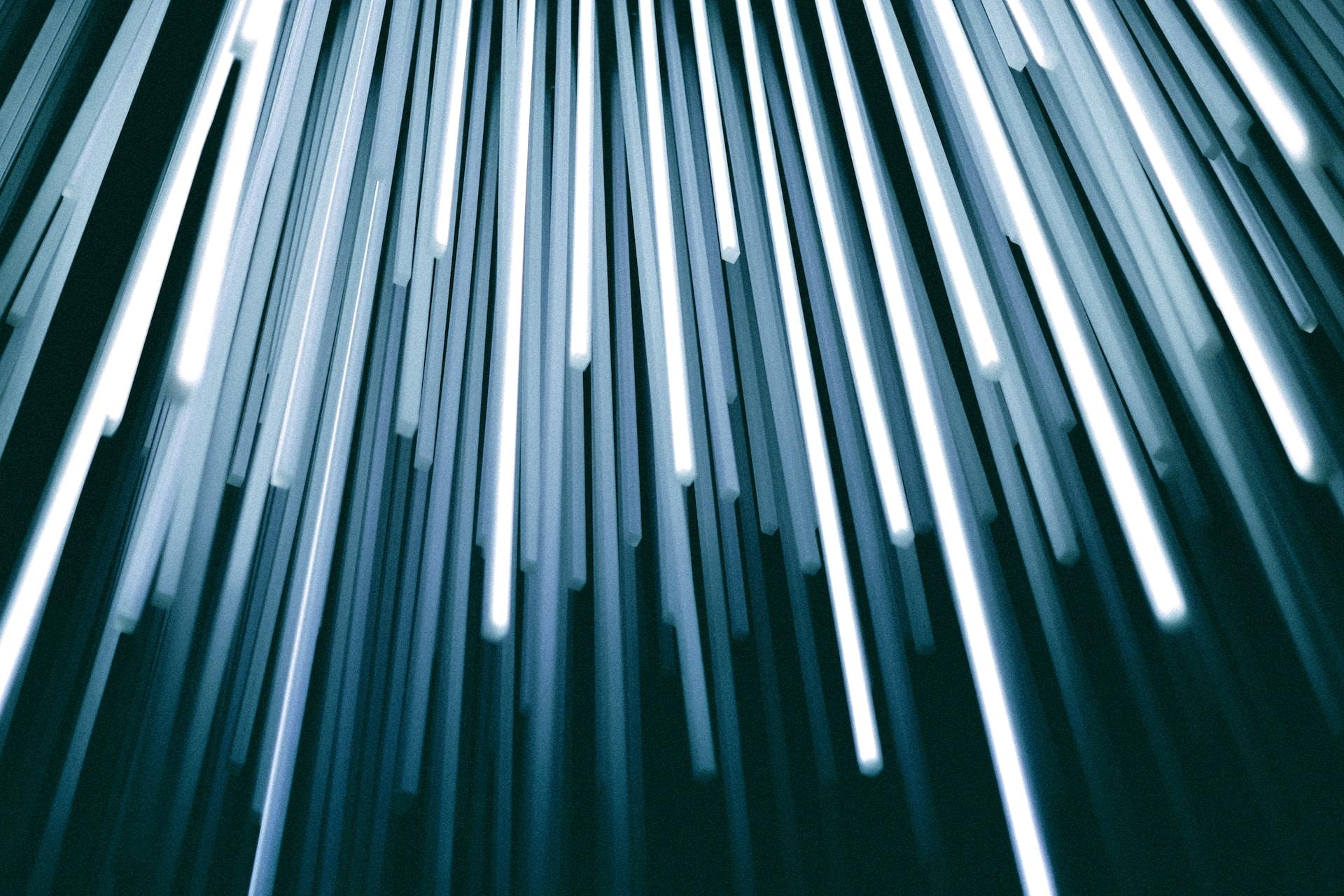Streaks of blue and white light beams.