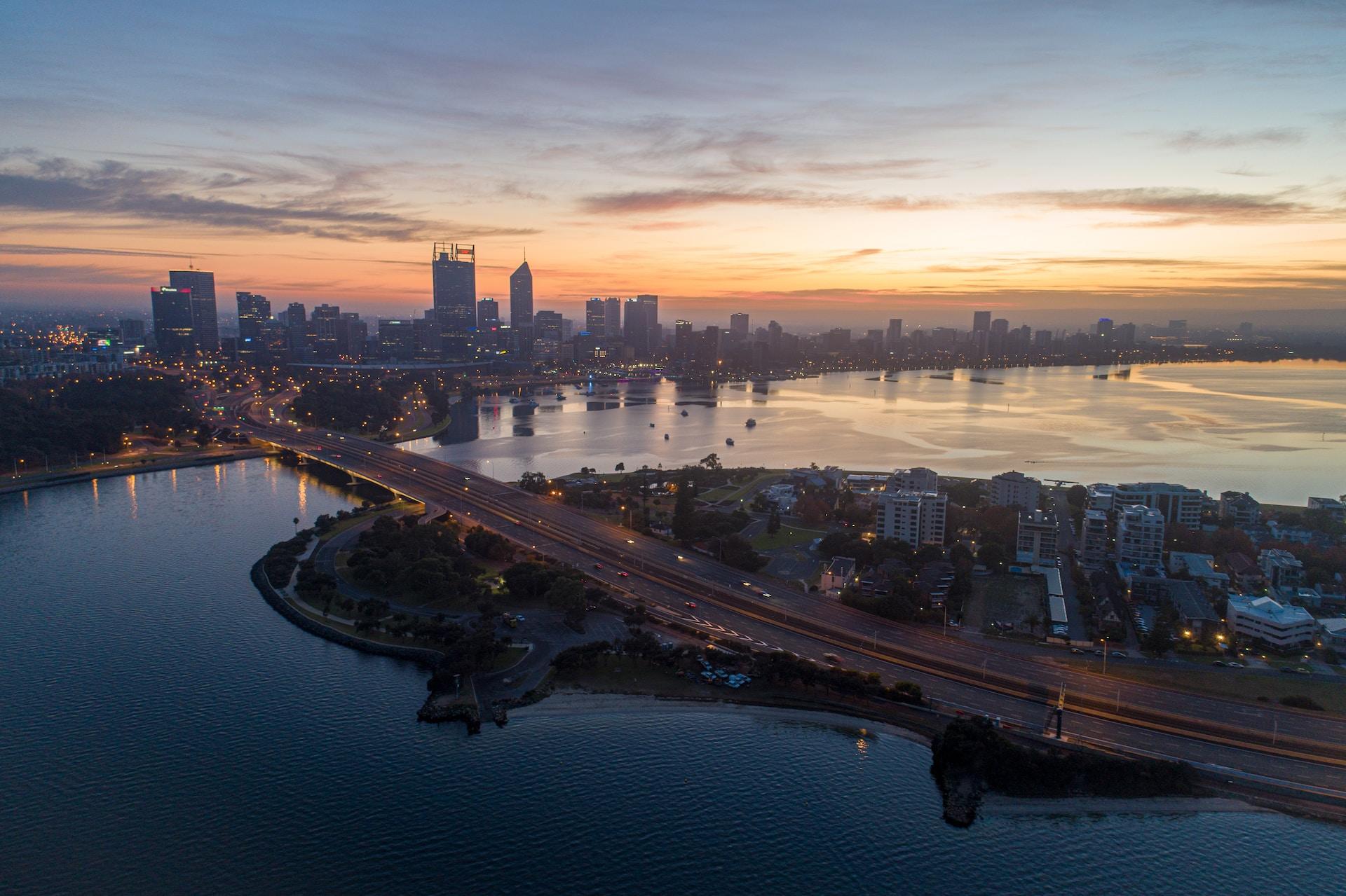 A view of the Perth skyline at sunset.