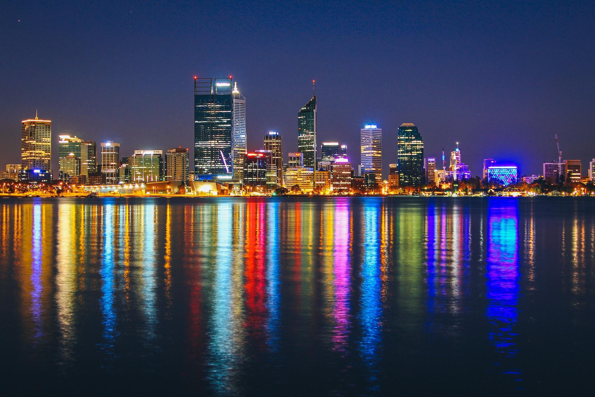 A view of Perth at night across the water.