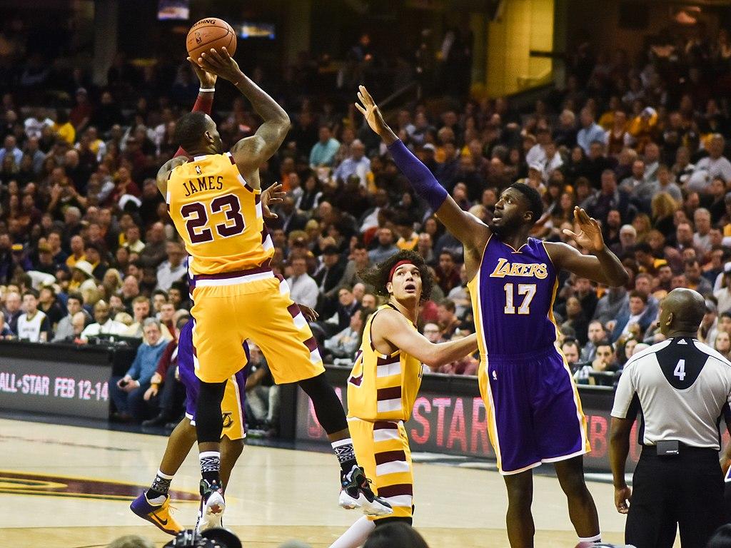 LeBron James playing for the Cleveland Cavaliers facing off against Los Angeles Lakers player #17.