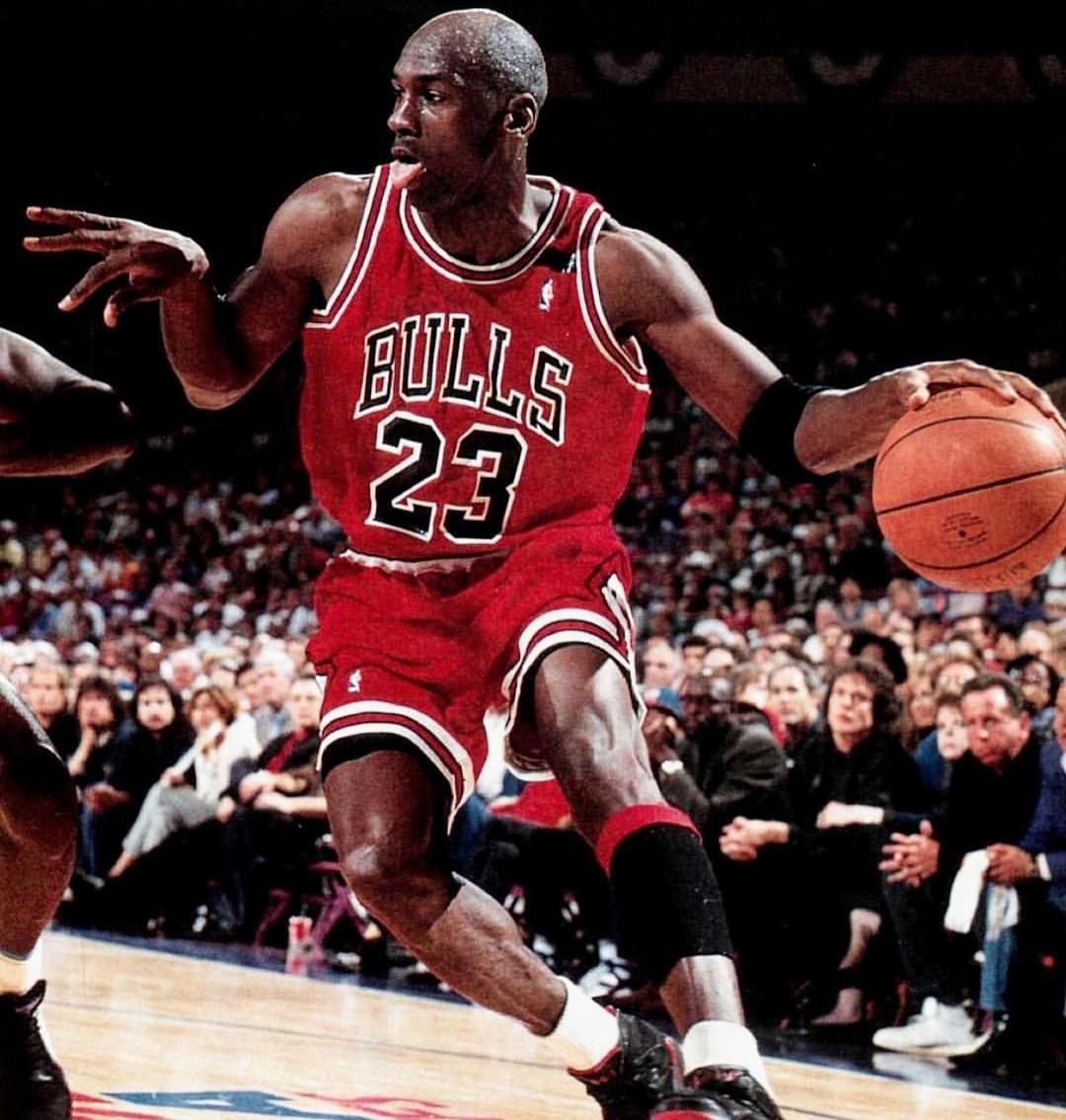 An action shot of Michael Jordan playing basketball