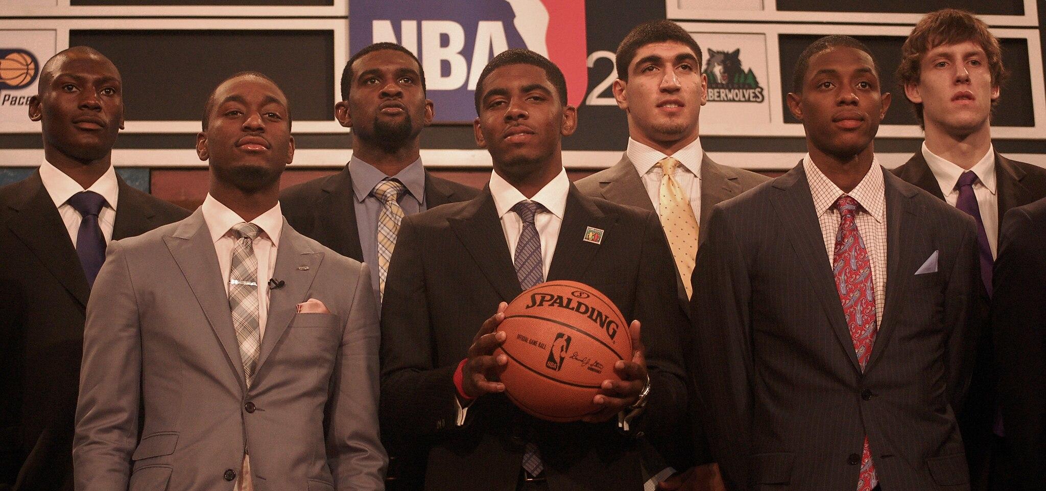 Kyrie Irving (center) and other members of the draft class at the 2011 NBA Draft.