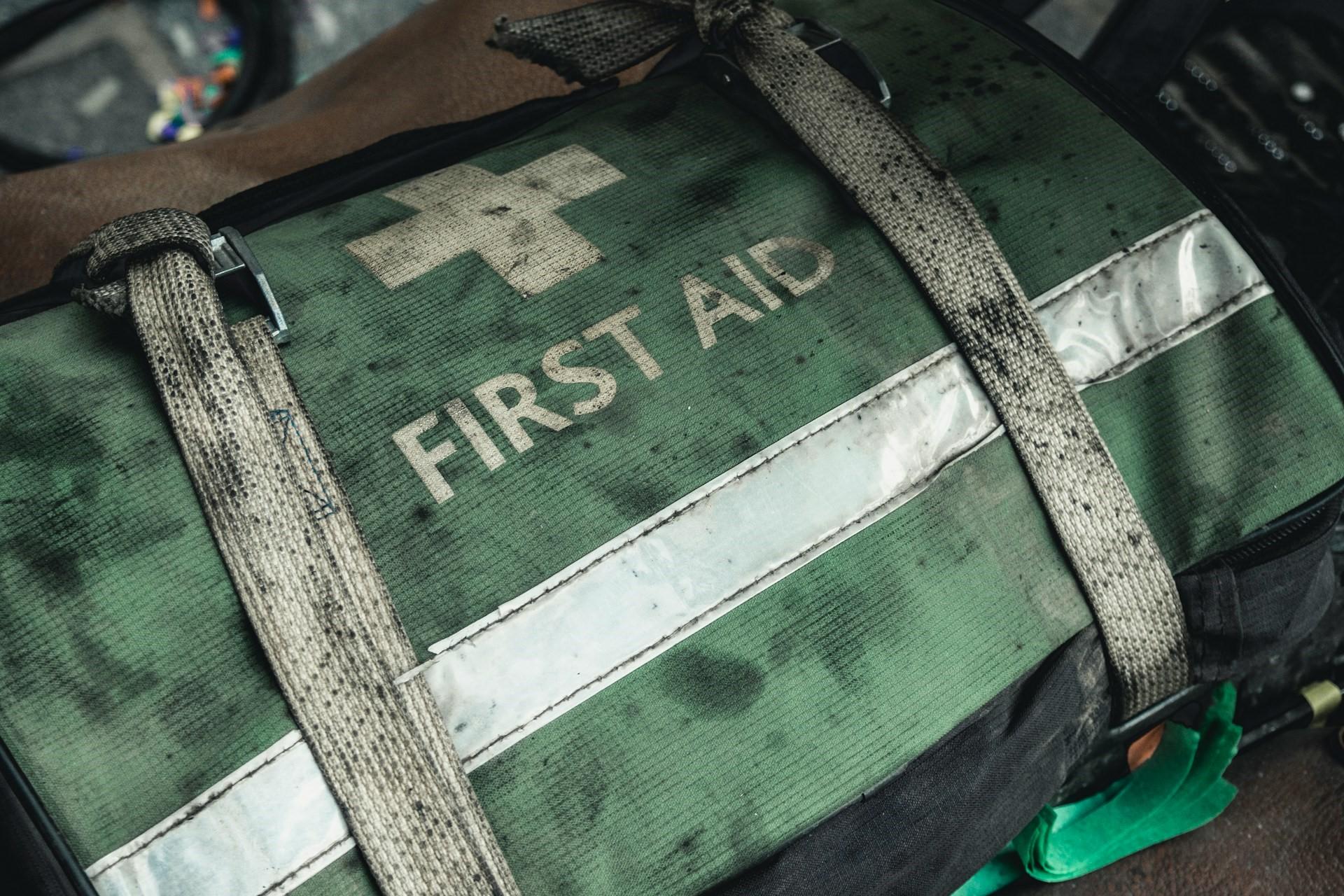 A dirty first aid kit.