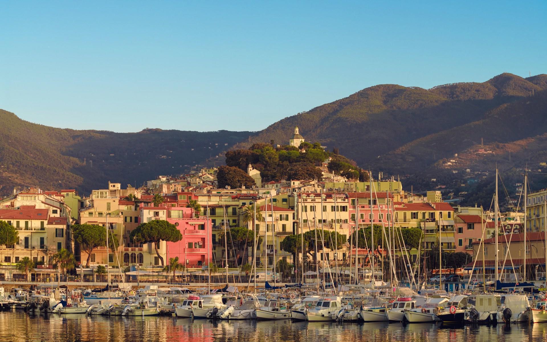 The Sanremo waterfront with mountains in the background.