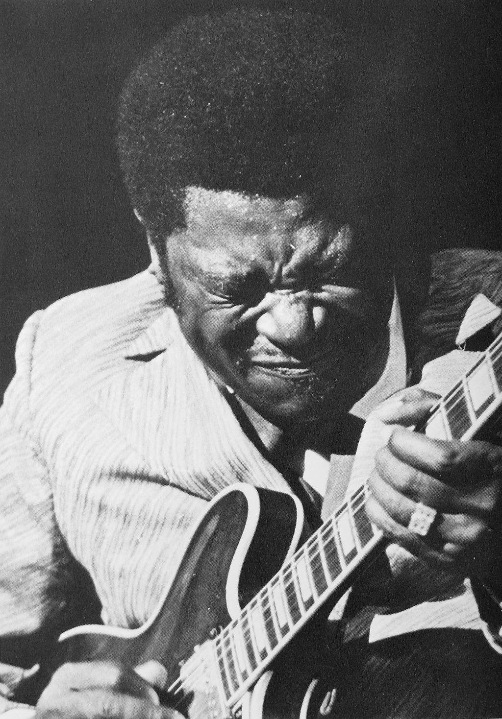 B.B. King playing guitar.