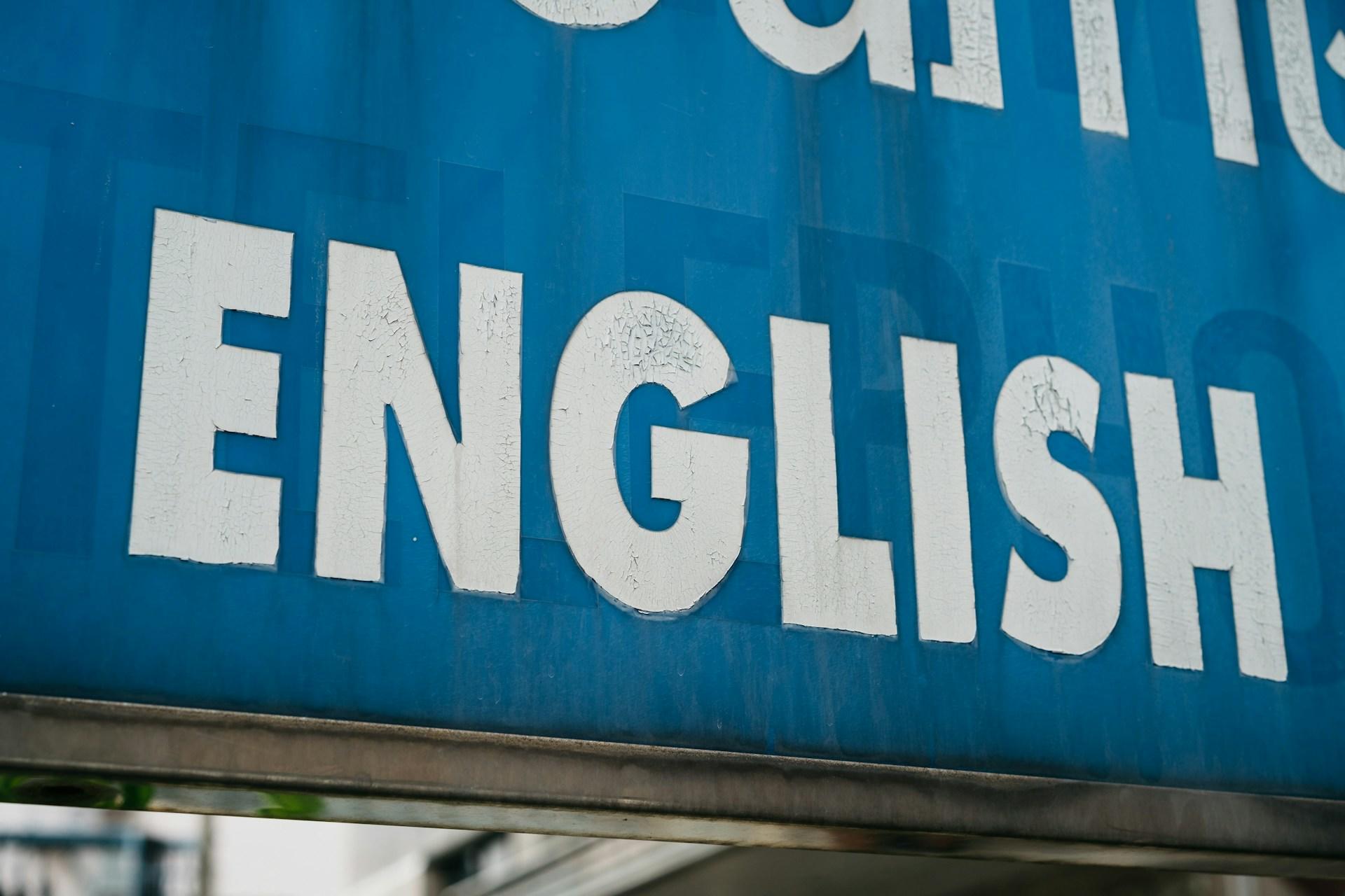 A blue banner with the word 'English' on it in white block lettering.