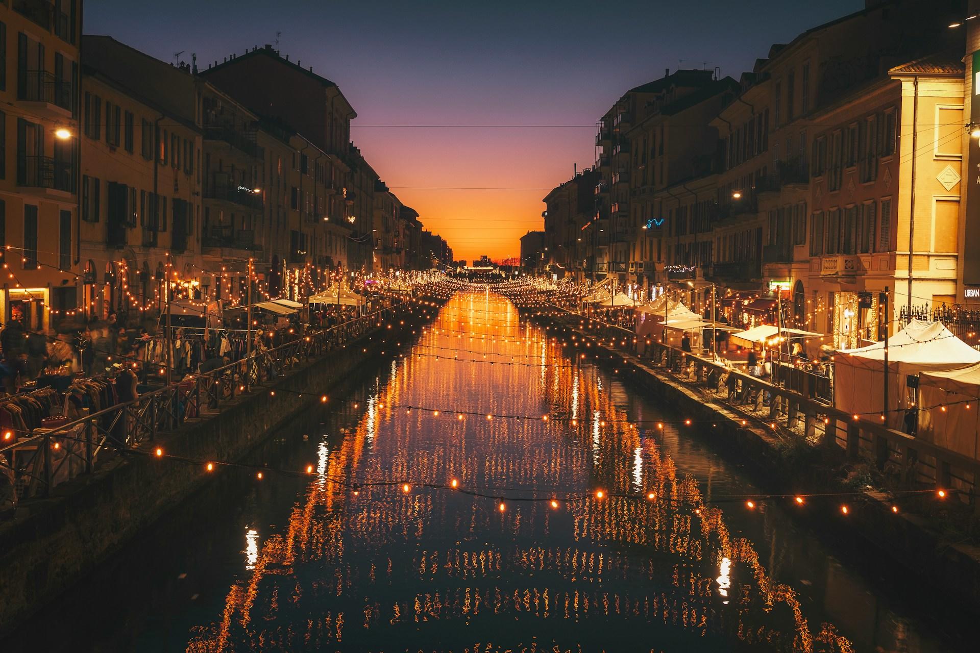 Christmas lights over a waterway in Milan, Italy.