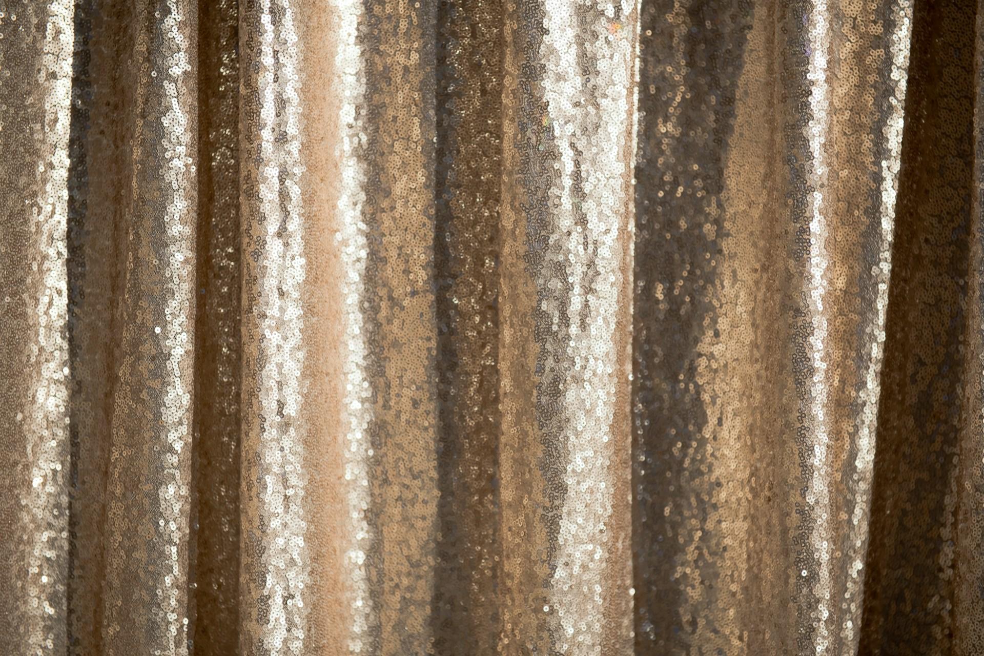 A gold sequined fabric.