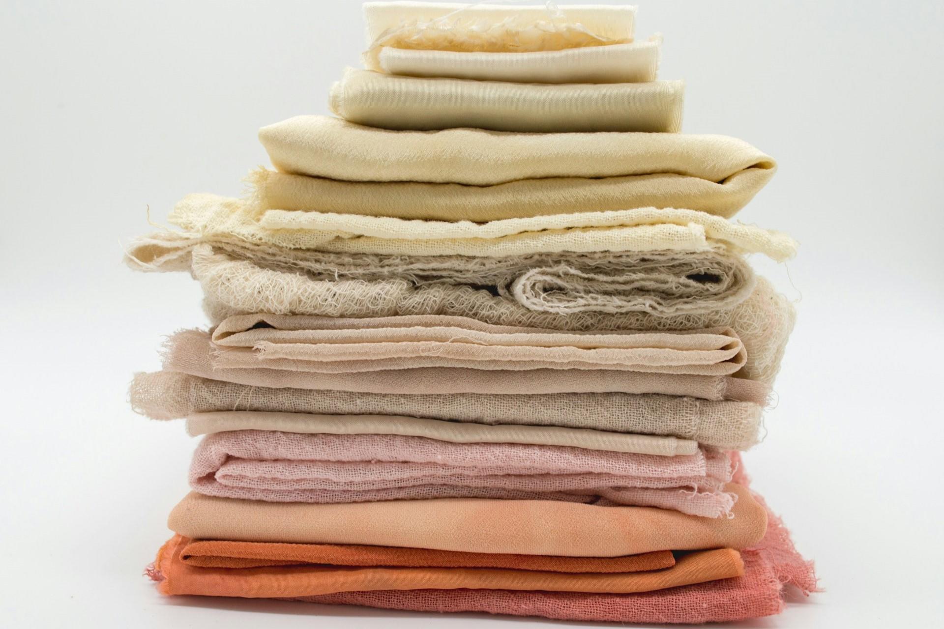 A pile of different pieces of fabric.