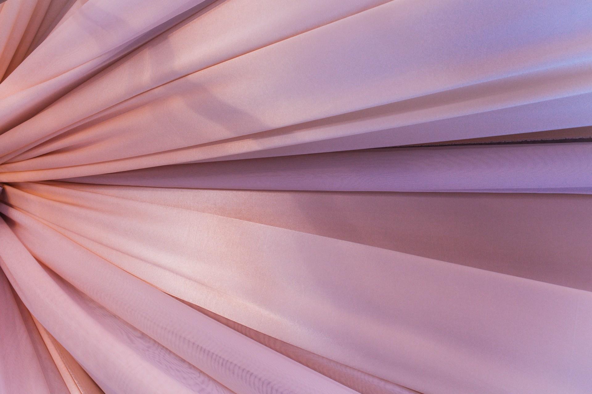 A closeup of a pink fabric.