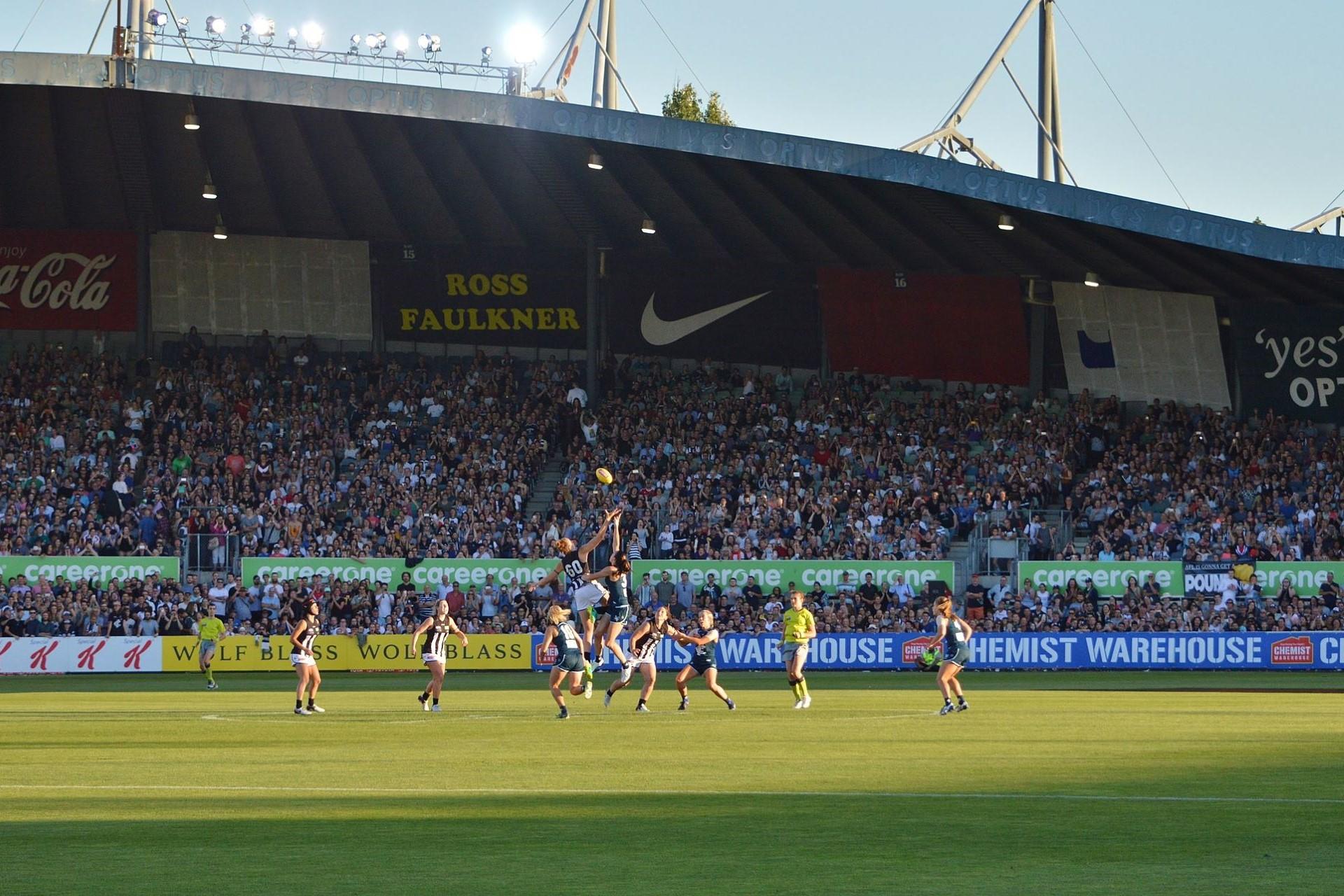 Players contest the first Ball-Up at the inaugural AFLW match in February 2017.