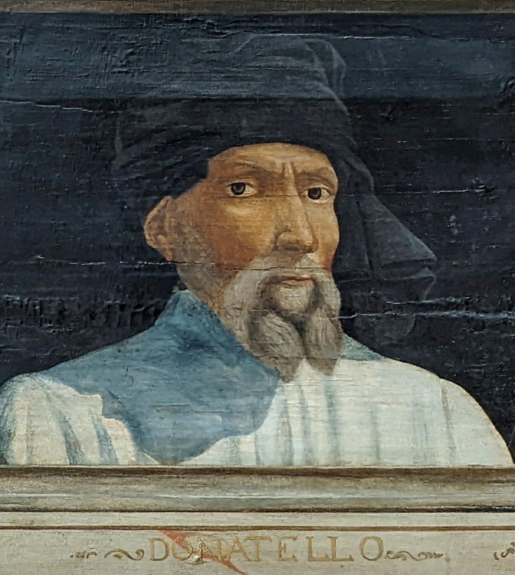 A painting of a man with a grey beard and moustache, wearing a black headdress and a white top.